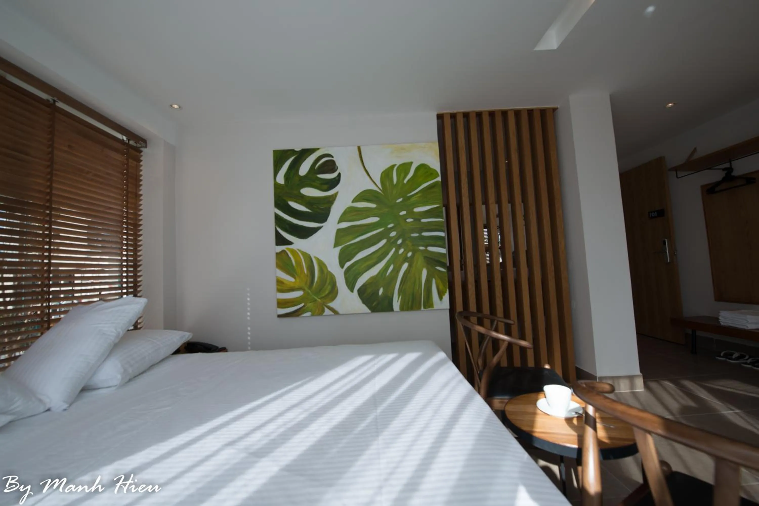 Bed in Mojzo Inn Boutique Hotel