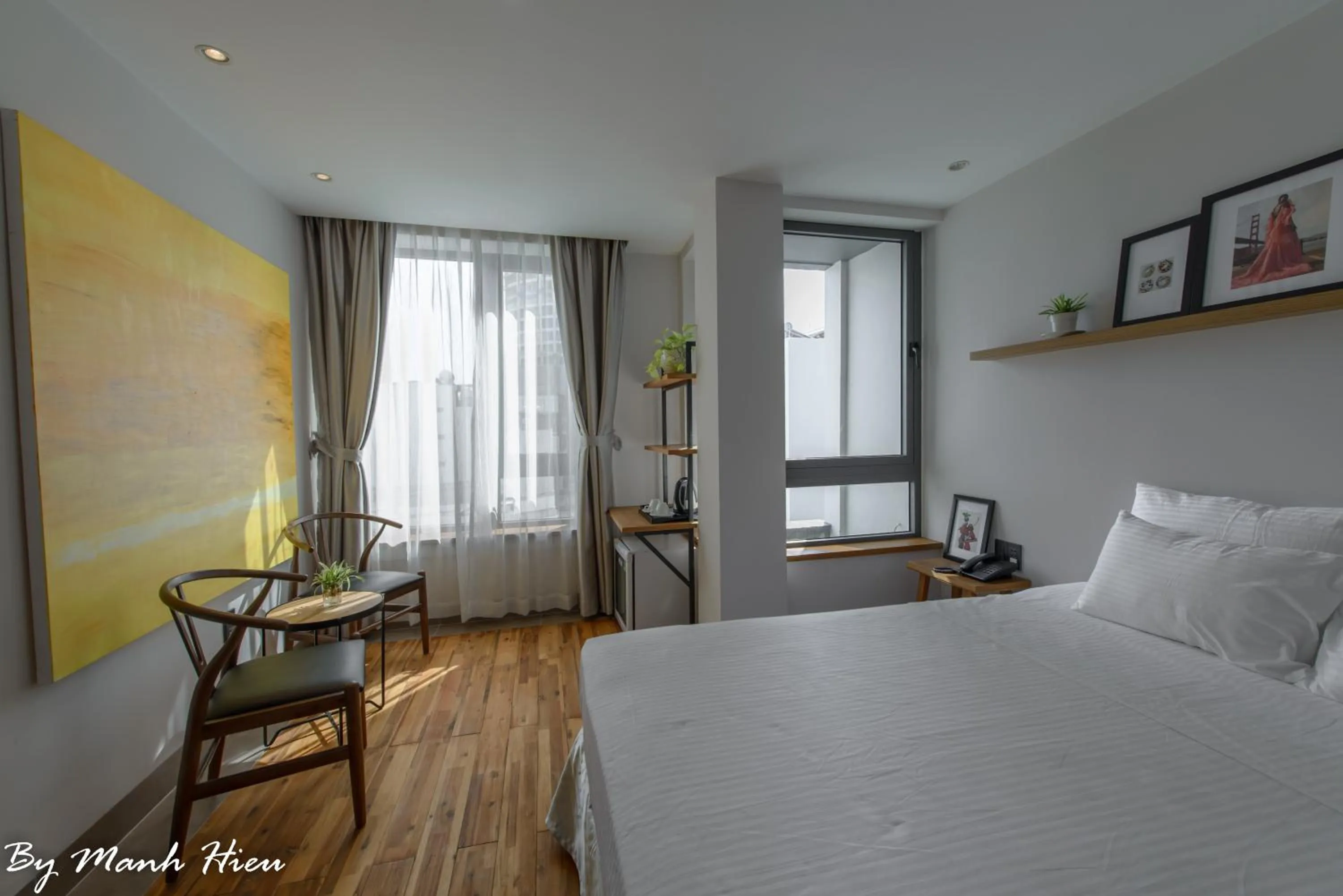 Bed in Mojzo Inn Boutique Hotel