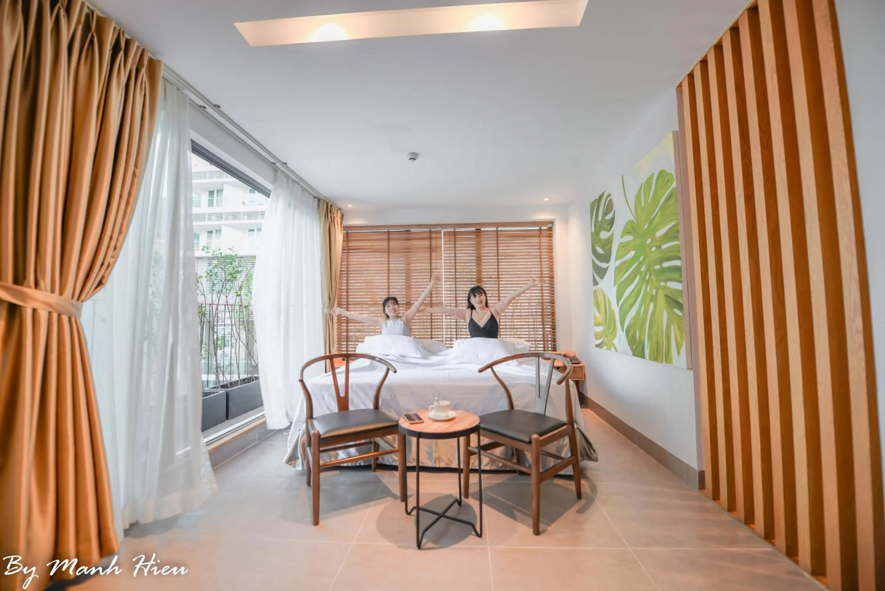 Bed in Mojzo Inn Boutique Hotel