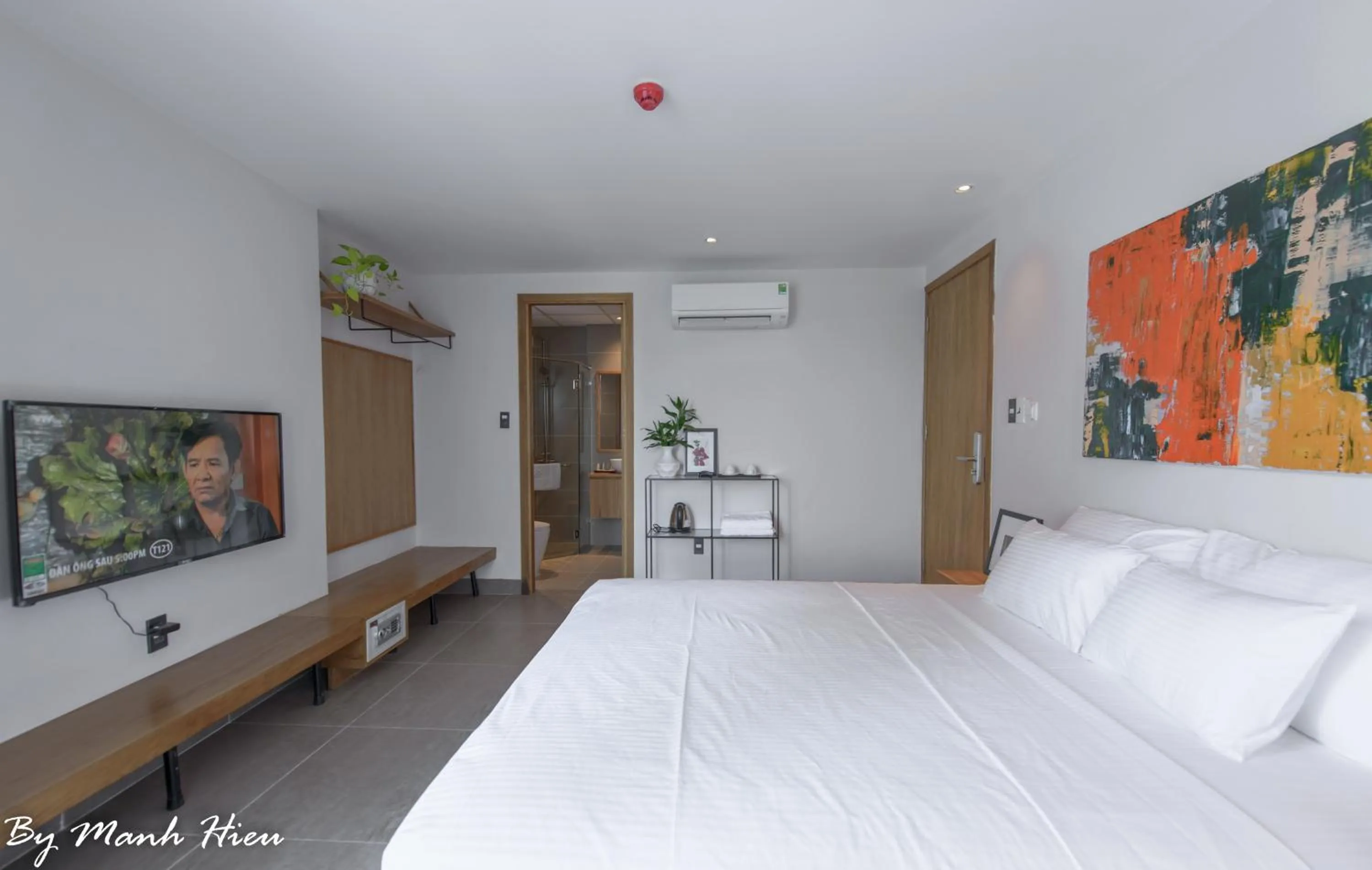 Bed in Mojzo Inn Boutique Hotel