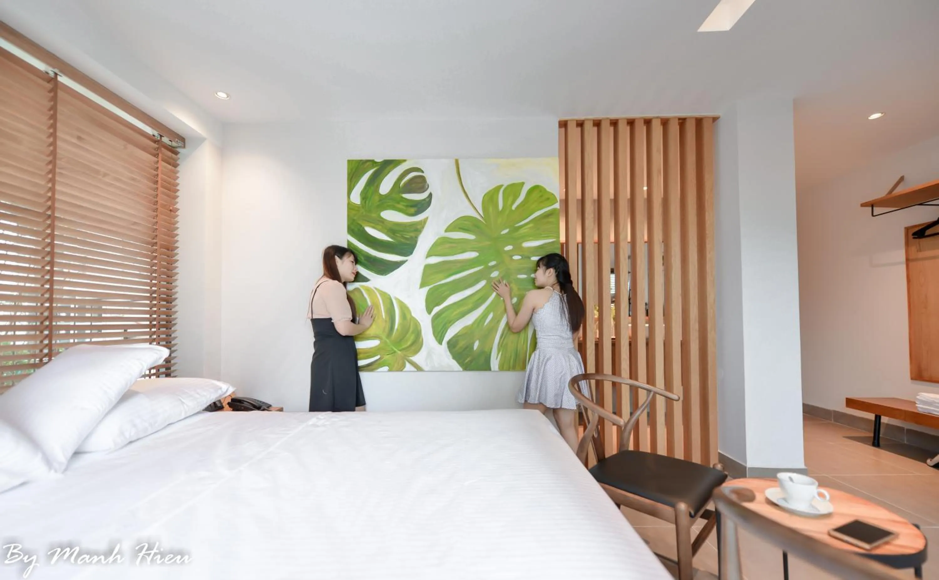 Bed in Mojzo Inn Boutique Hotel