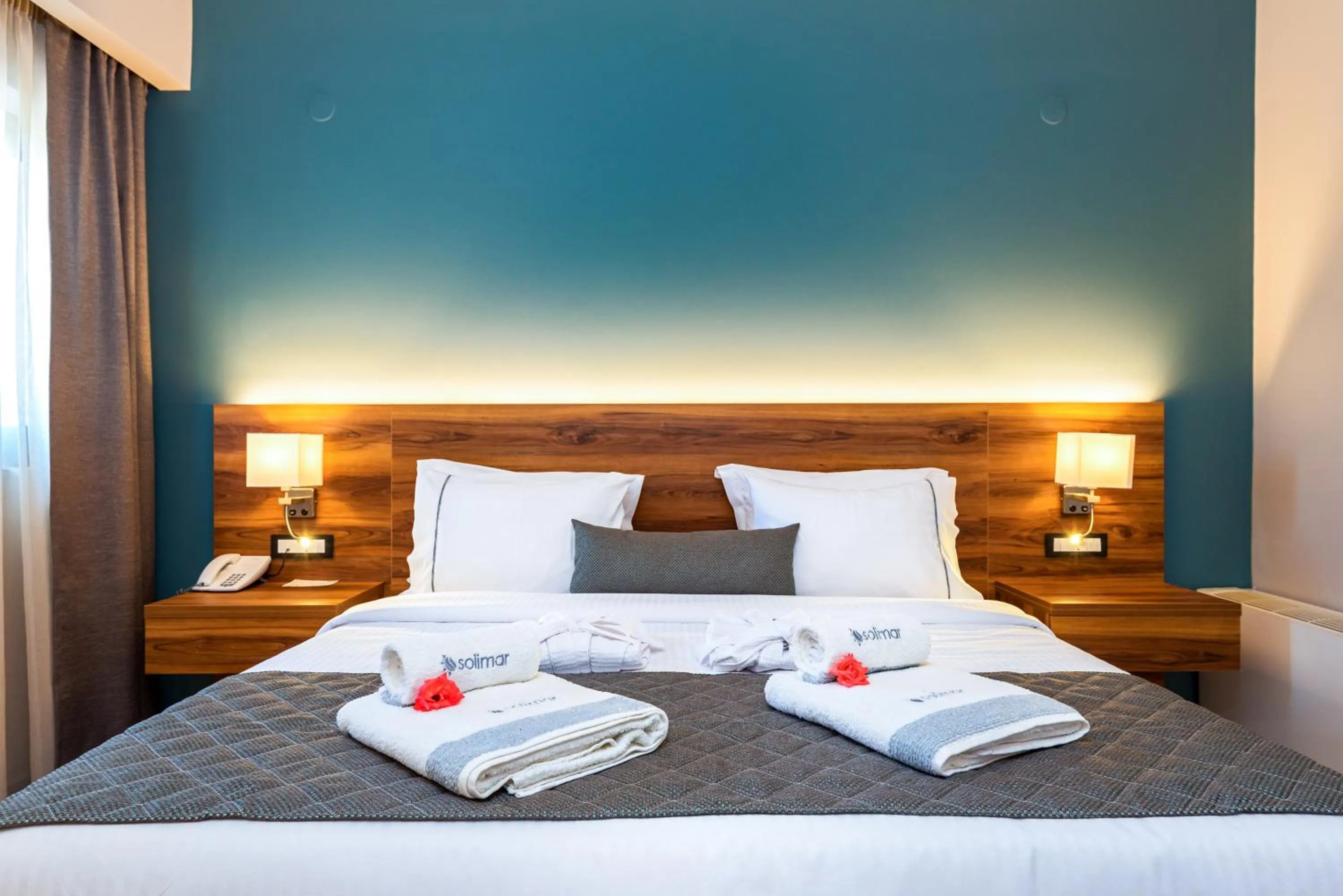 Bed in Solimar Aquamarine Resort