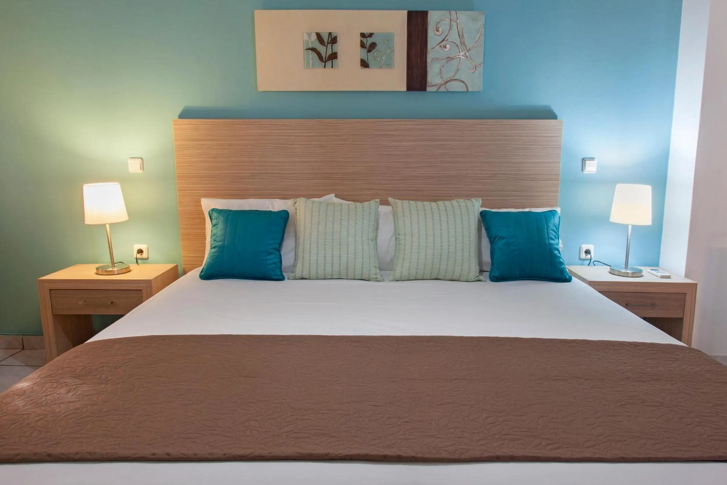 Bed in Minos Apartments & Studios