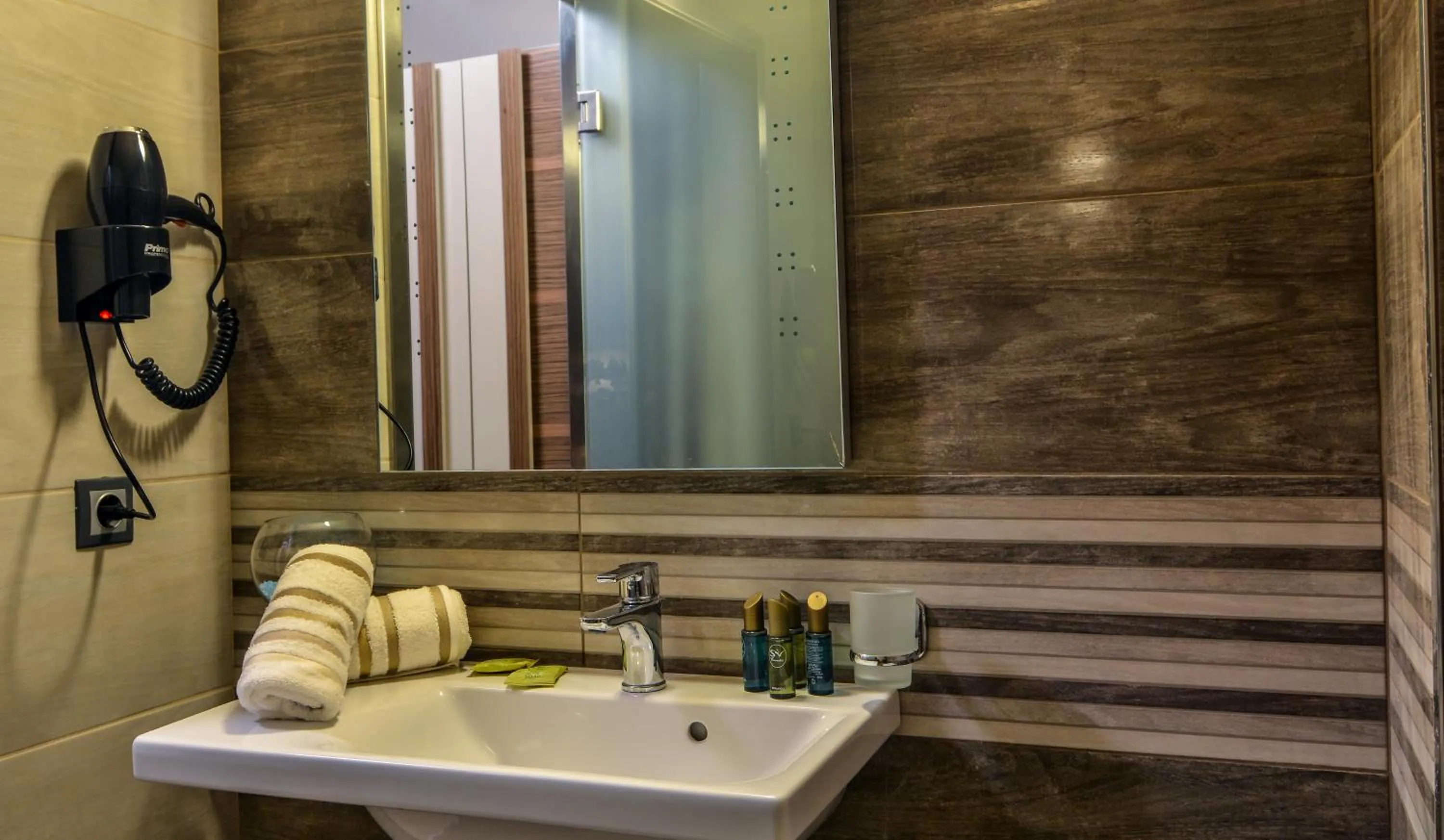 Bathroom in Porto Del Sol Hotel