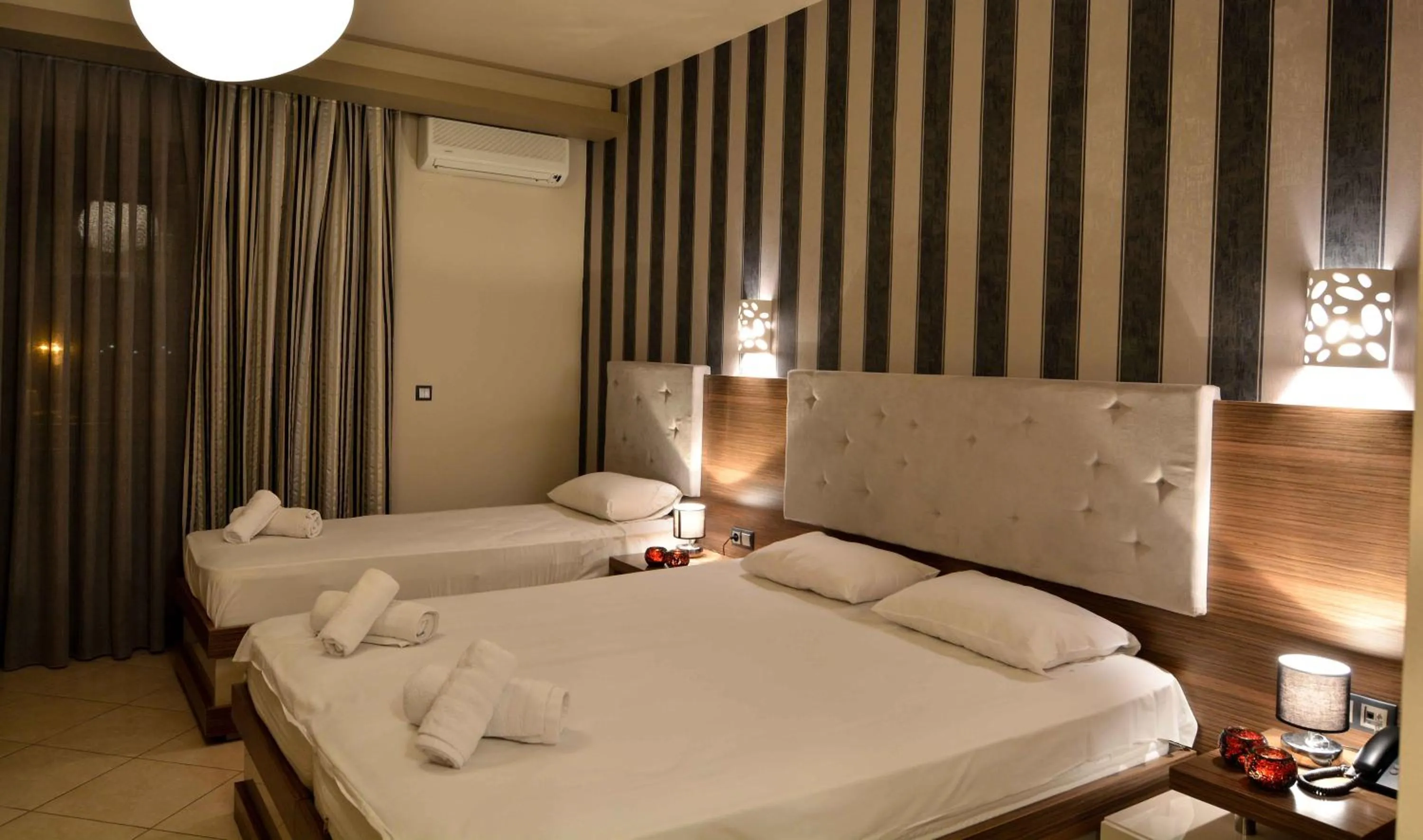 Bed in Porto Del Sol Hotel