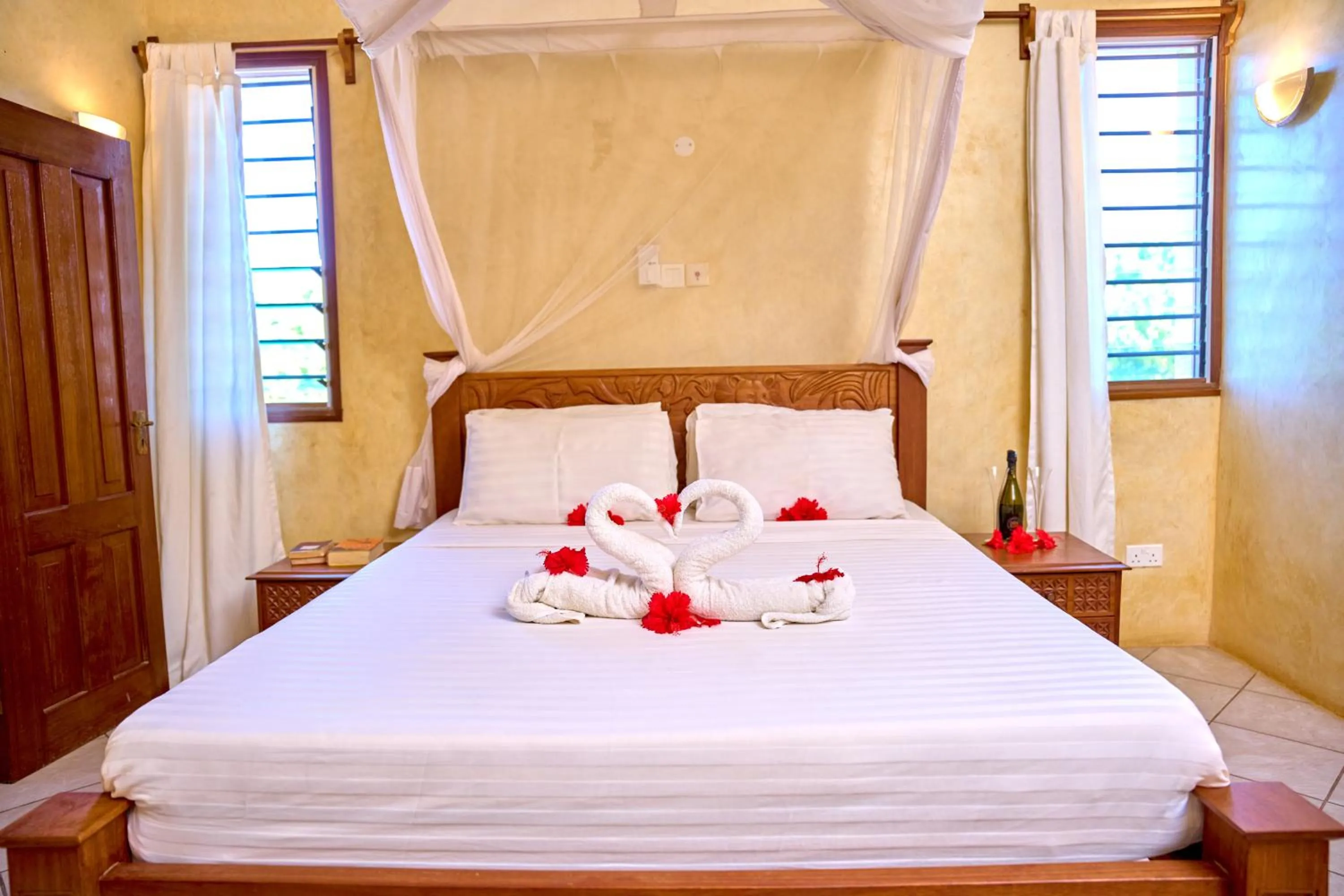 Bed in Flametree Beach Homes