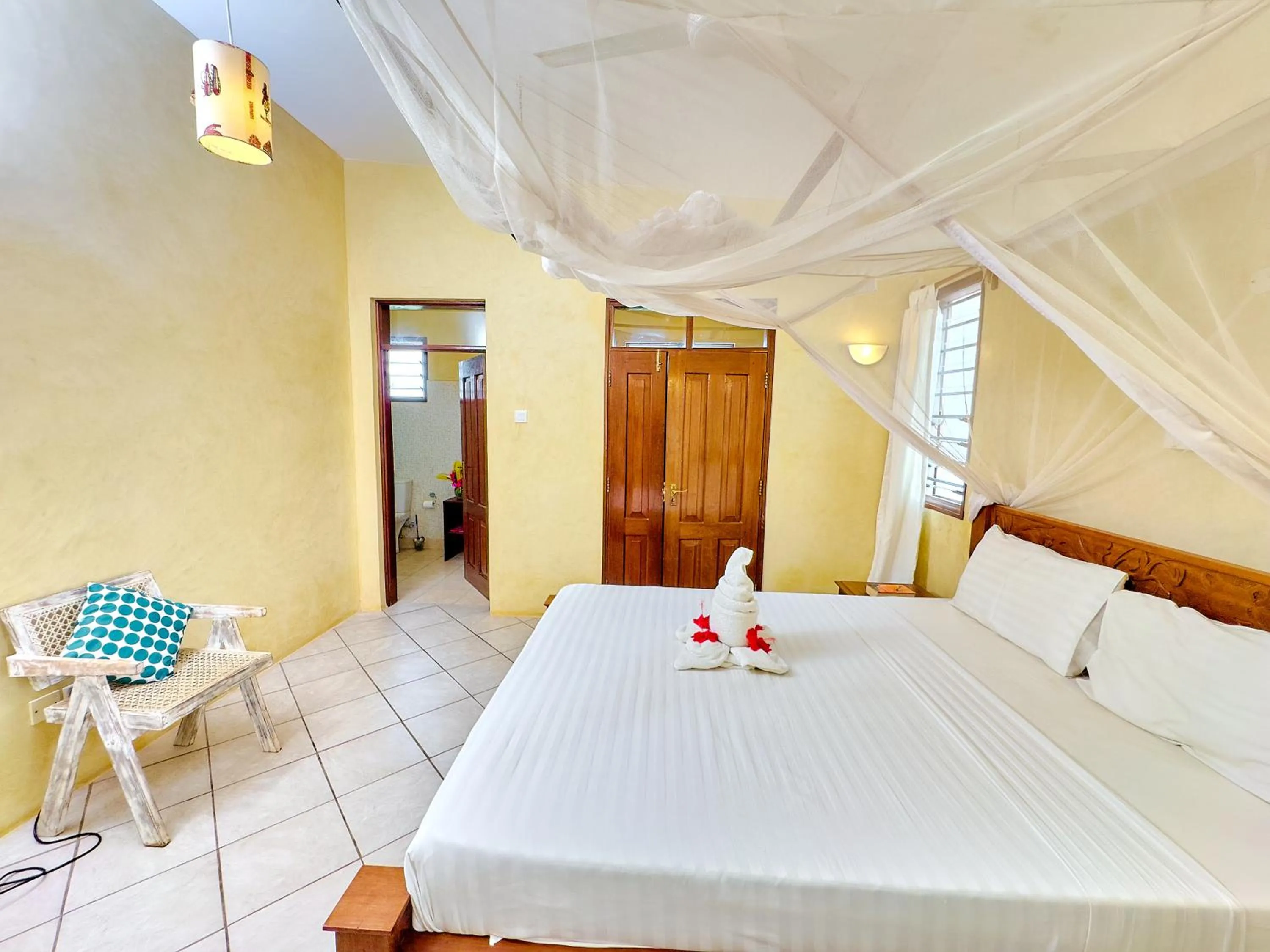 Photo of the whole room, Bed in Flametree Beach Homes