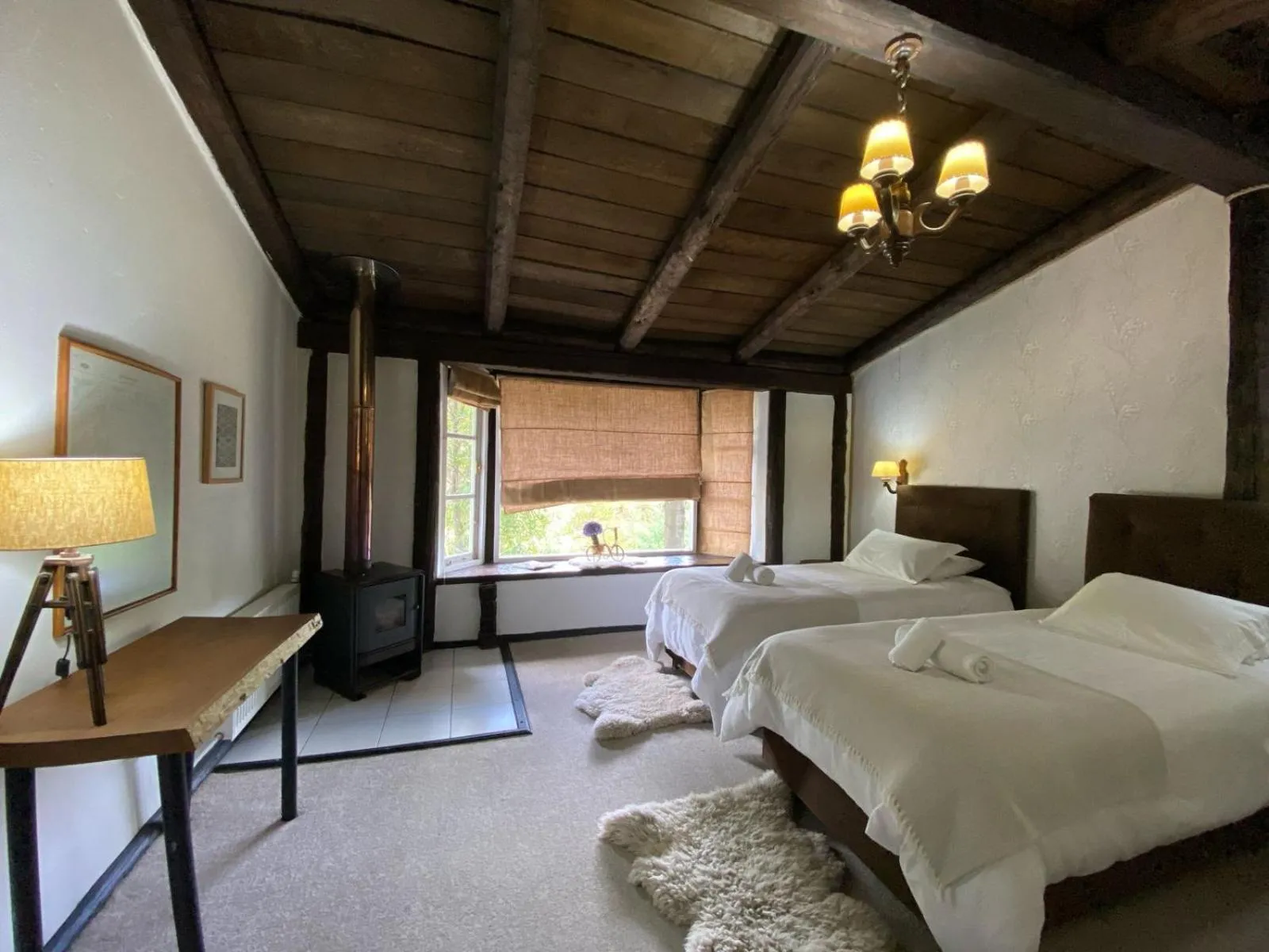 Seating area, Bed in The Patagonian Lodge