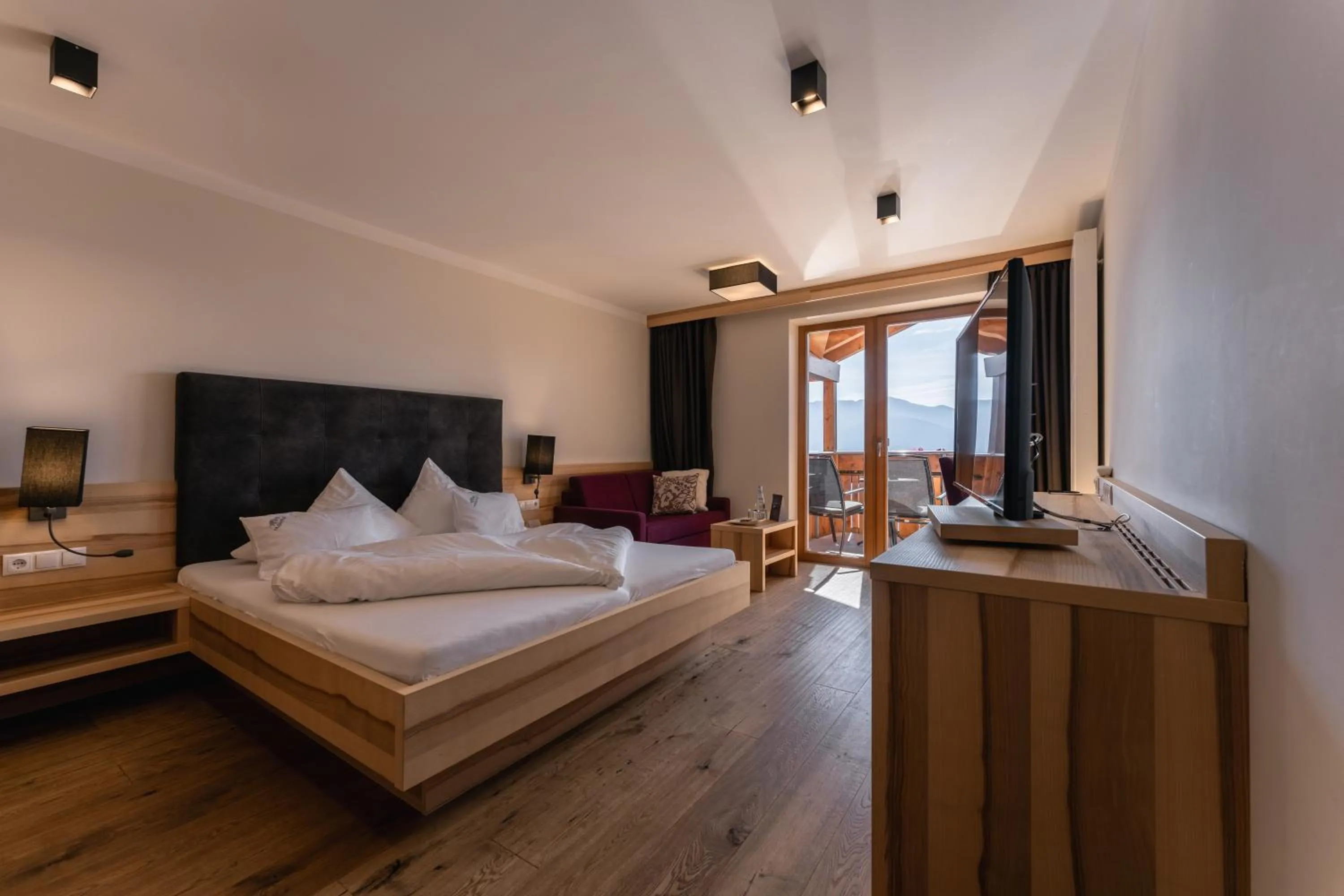 Photo of the whole room, Bed in Panoramahotel Huberhof