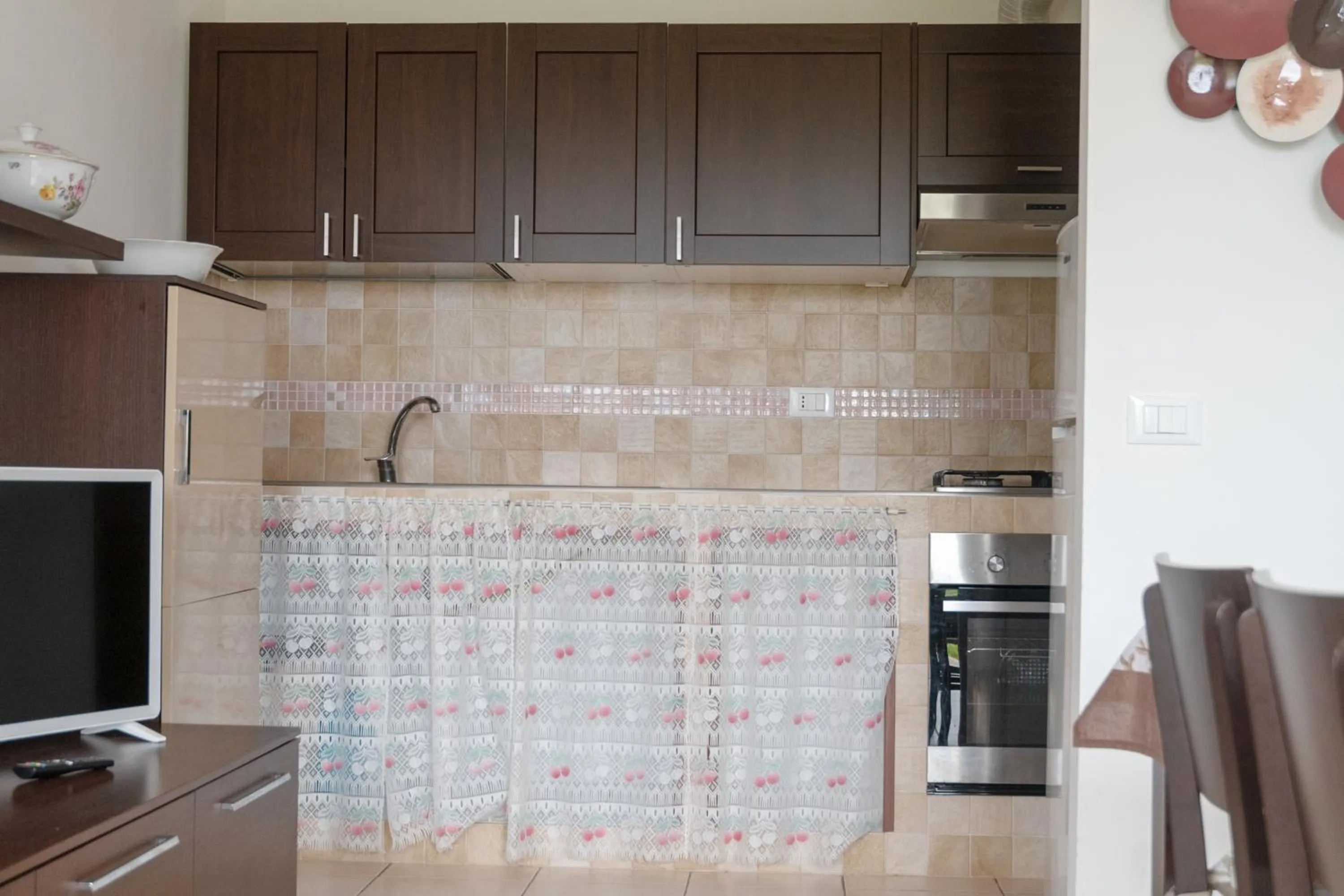 TV and multimedia in I Lecci Guesthouse