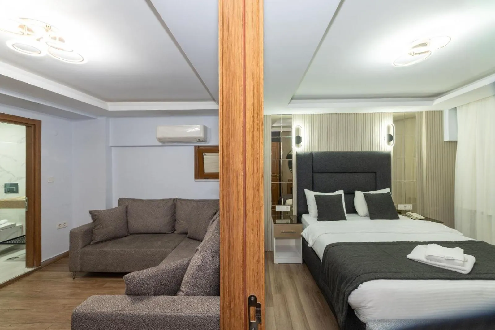 Living room, Bed in T-Square Residence