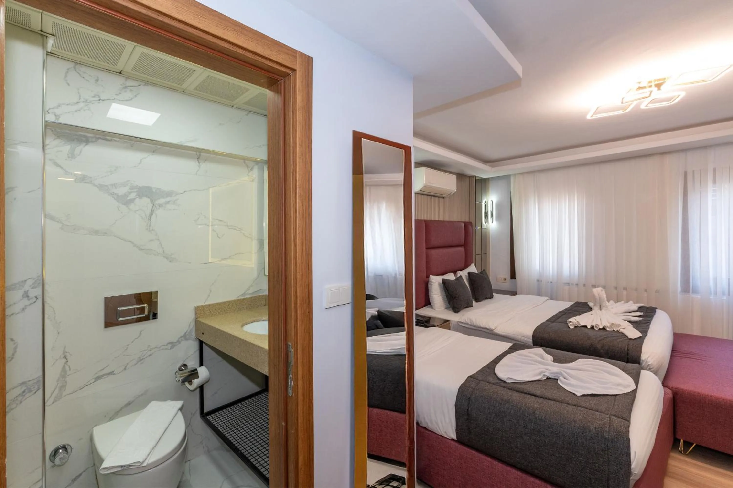 Shower, Bed in T-Square Residence