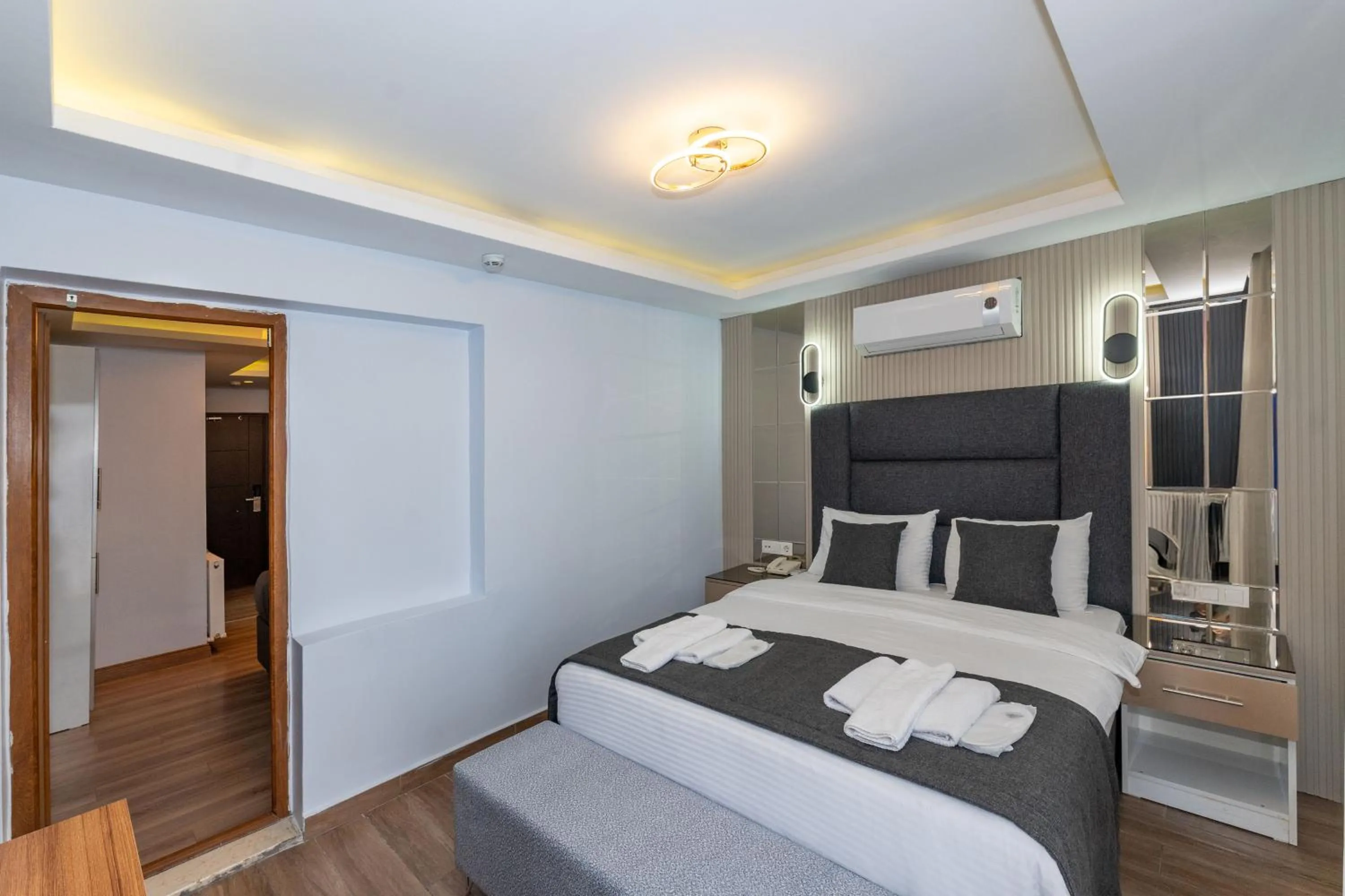 Bed in T-Square Residence