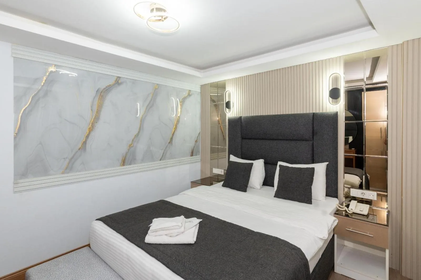 Bed in T-Square Residence