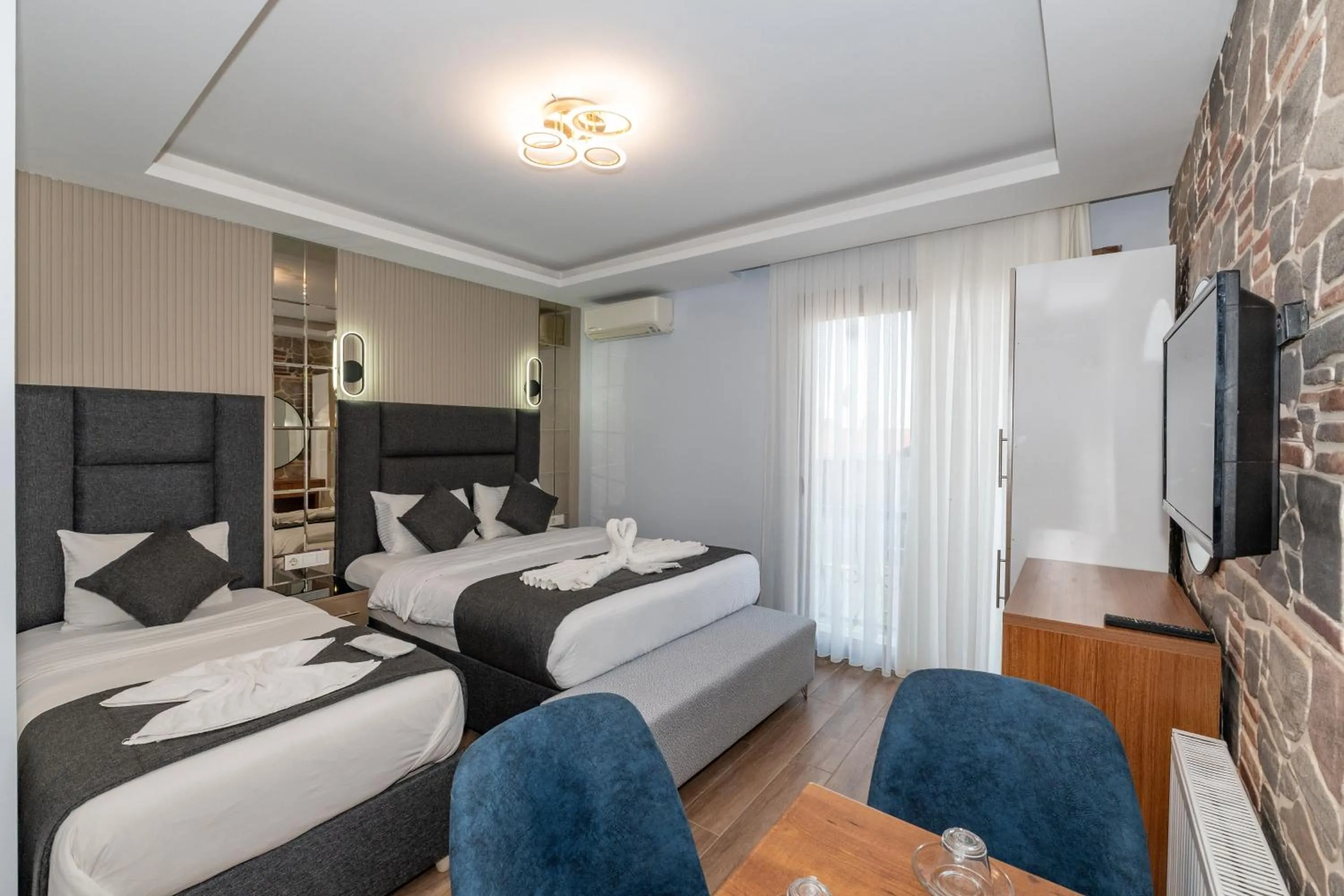 Bed in T-Square Residence