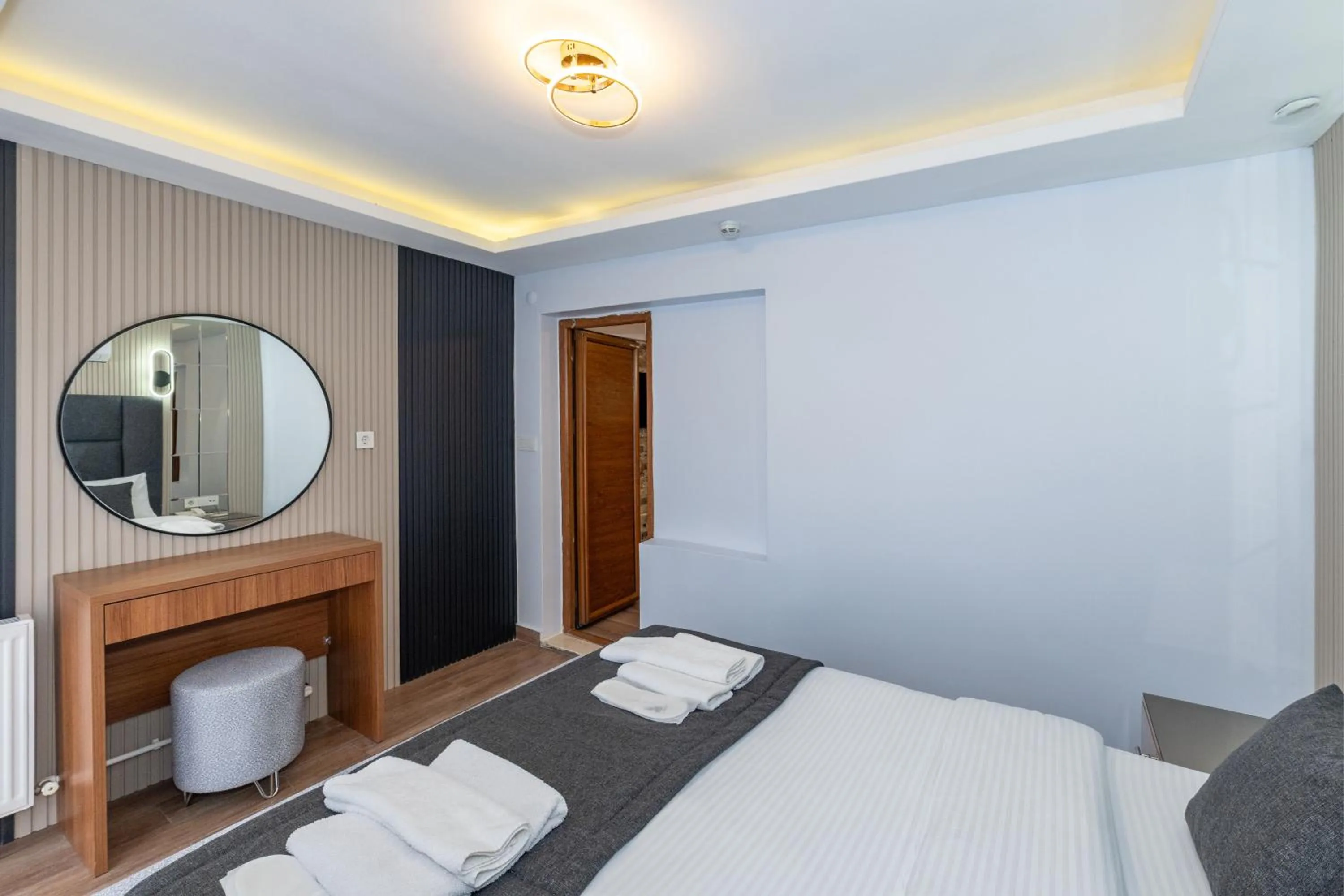 Bed in T-Square Residence