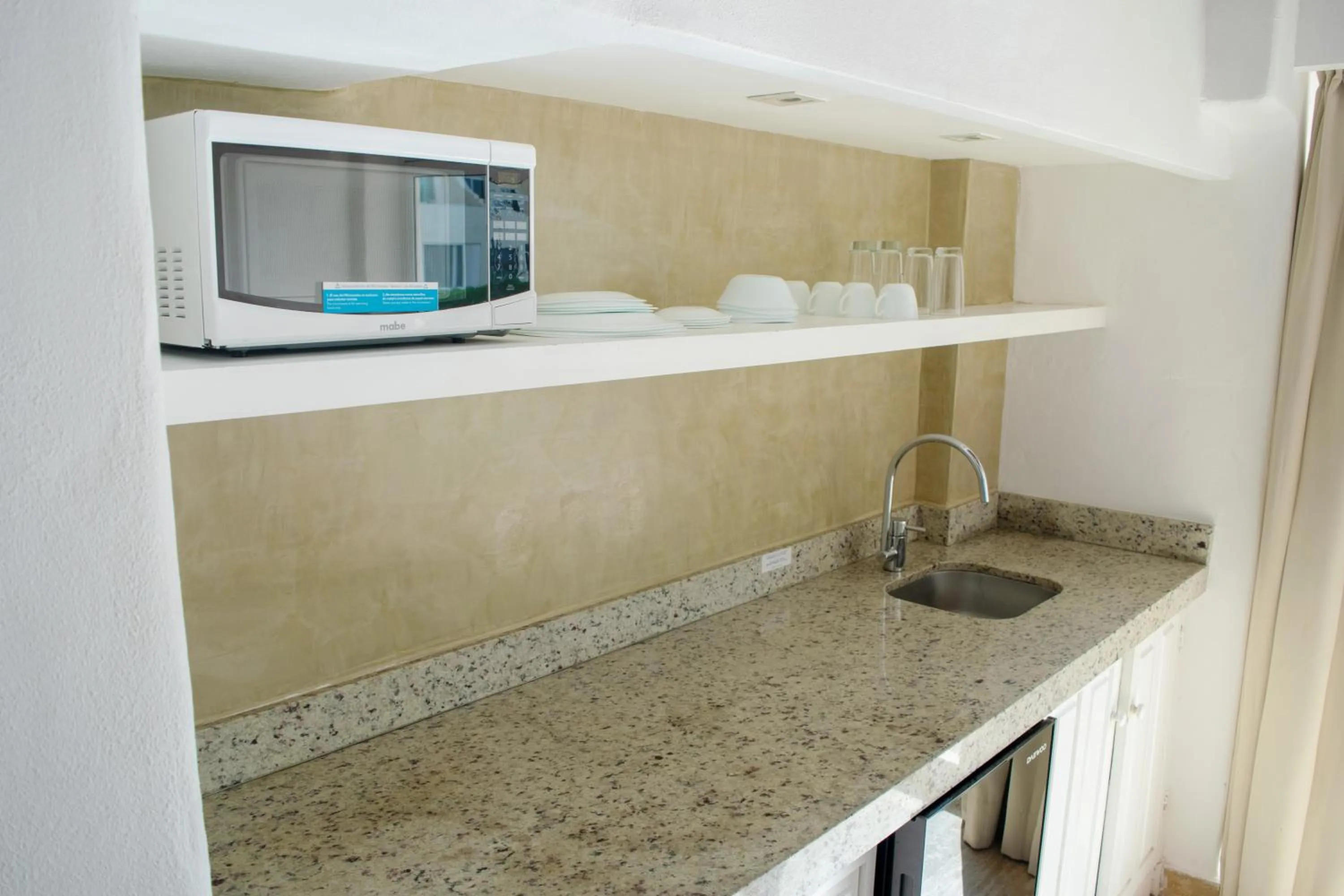 Kitchen or kitchenette in BSEA Cancun Plaza Hotel