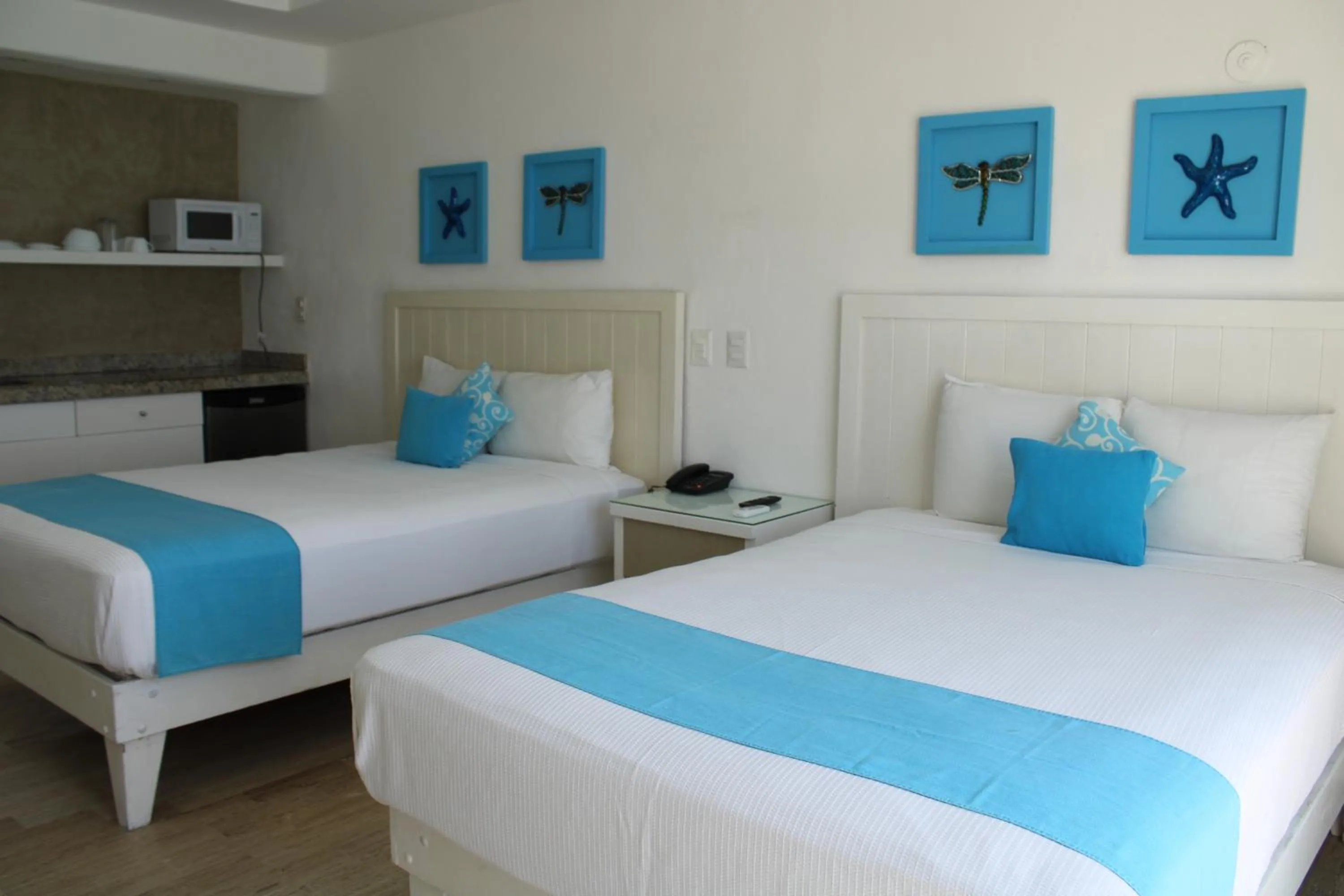 Bed in BSEA Cancun Plaza Hotel