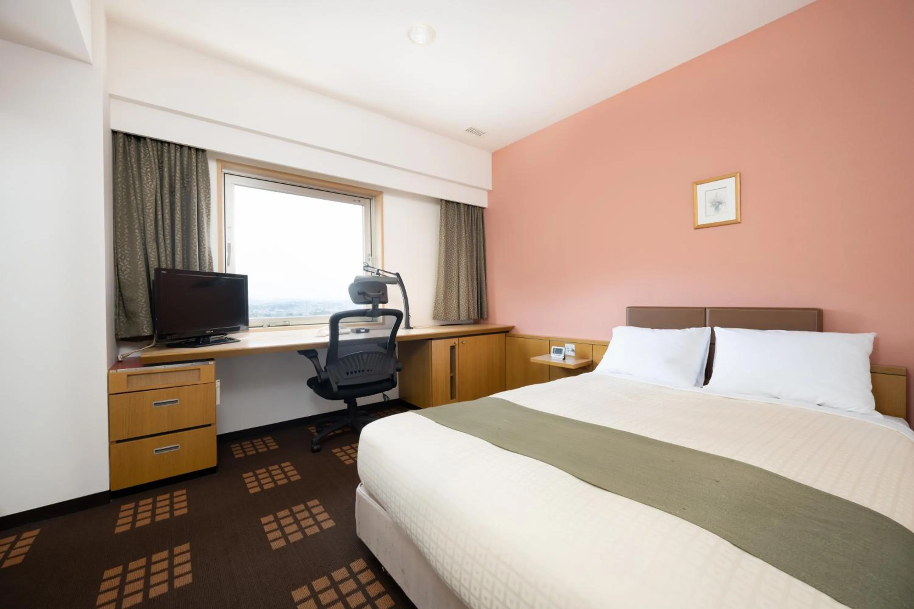 Bed in Tachikawa Washington Hotel