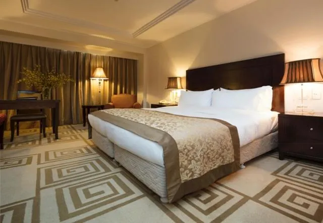 Bed in Beijing Continental Grand Hotel