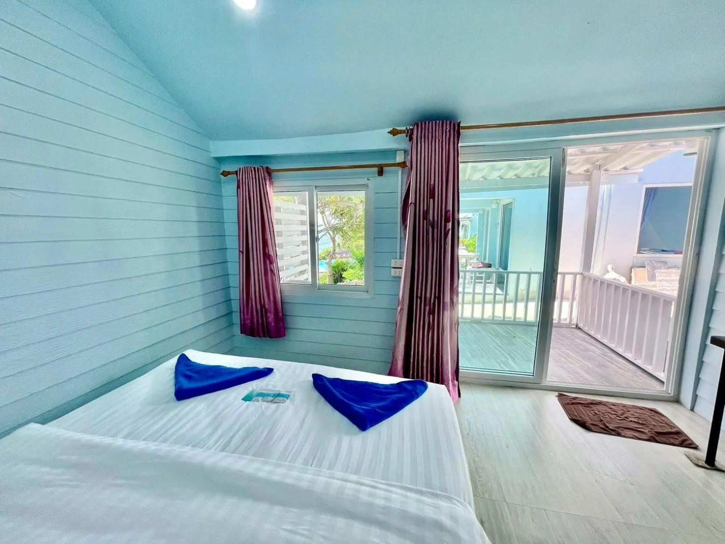 Bed in Naiharn On The Rock Resort Phuket