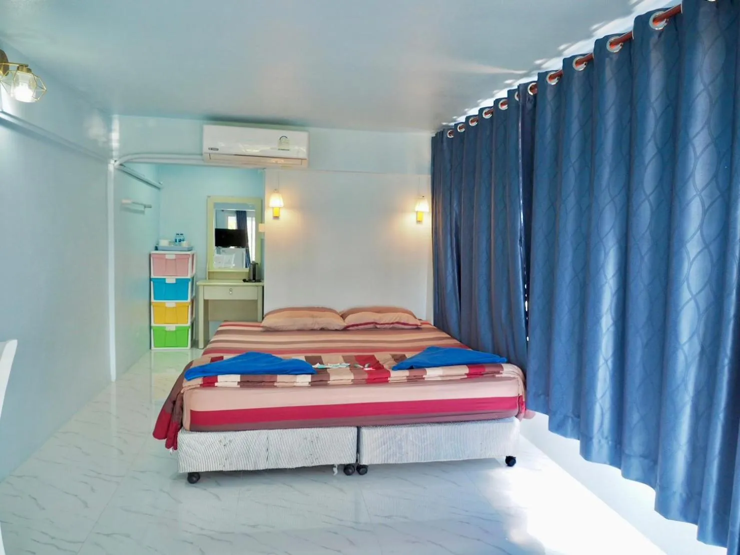 Bed in Naiharn On The Rock Resort Phuket