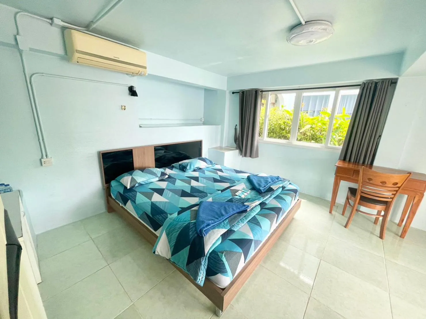 Bed in Naiharn On The Rock Resort Phuket