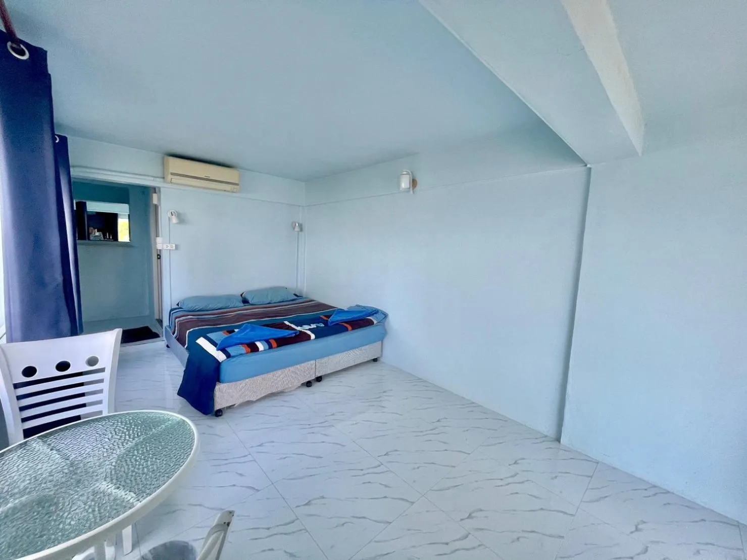 Bed in Naiharn On The Rock Resort Phuket