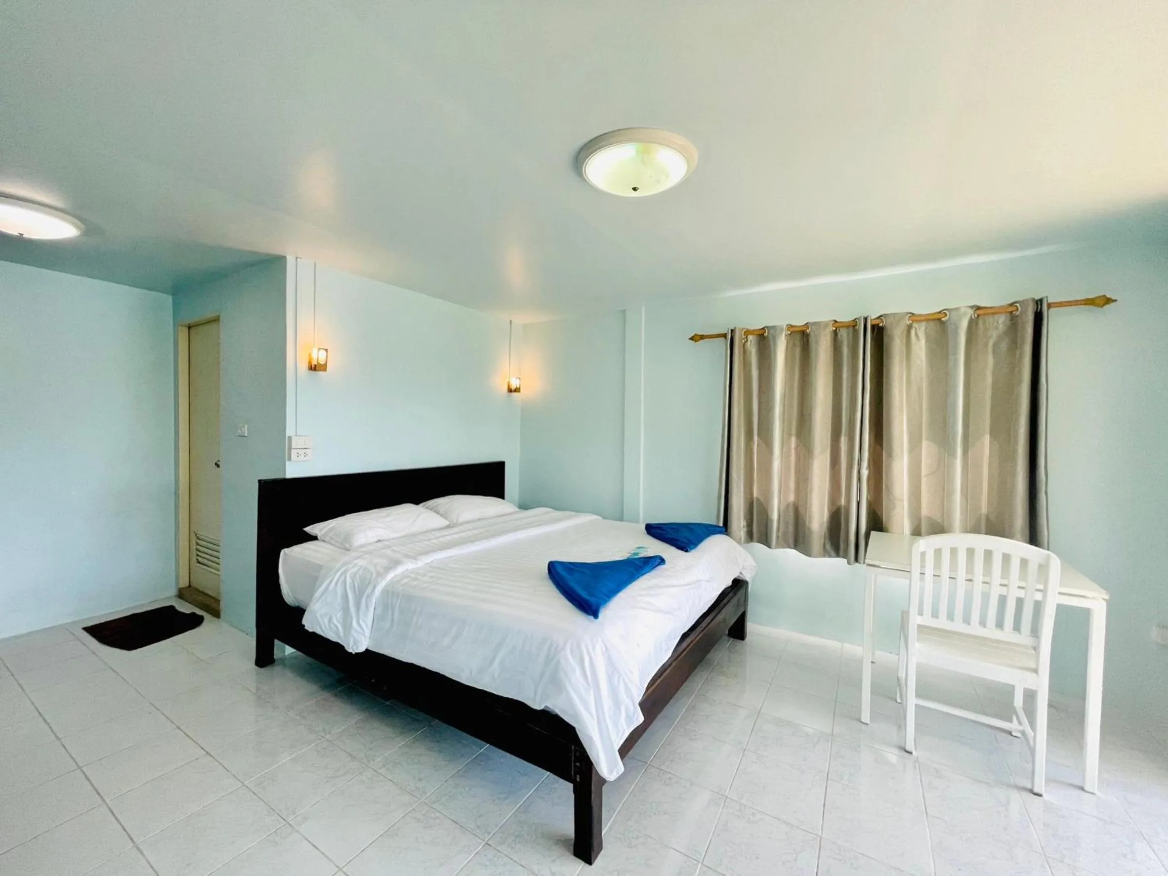 Bed in Naiharn On The Rock Resort Phuket