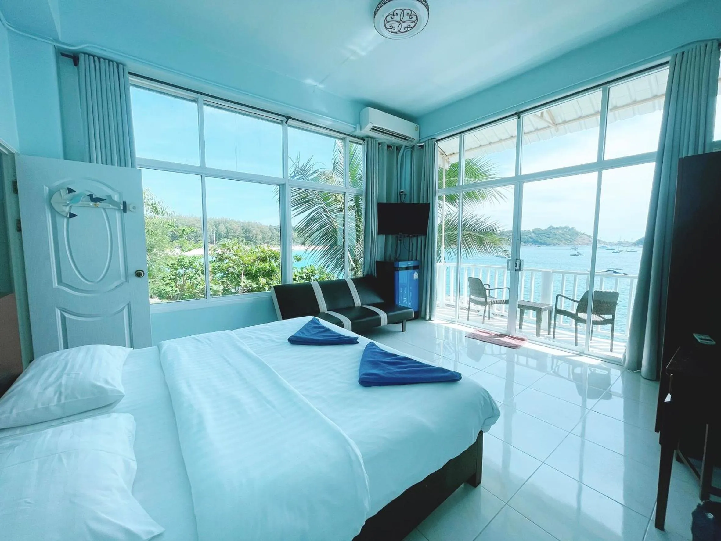 Bed in Naiharn On The Rock Resort Phuket