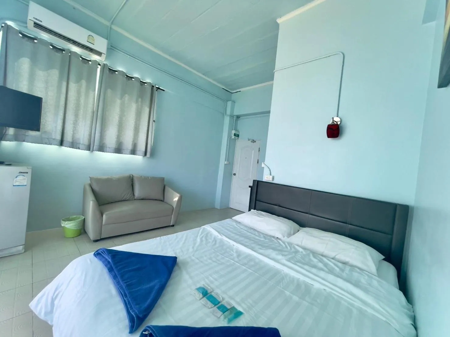 Bed in Naiharn On The Rock Resort Phuket