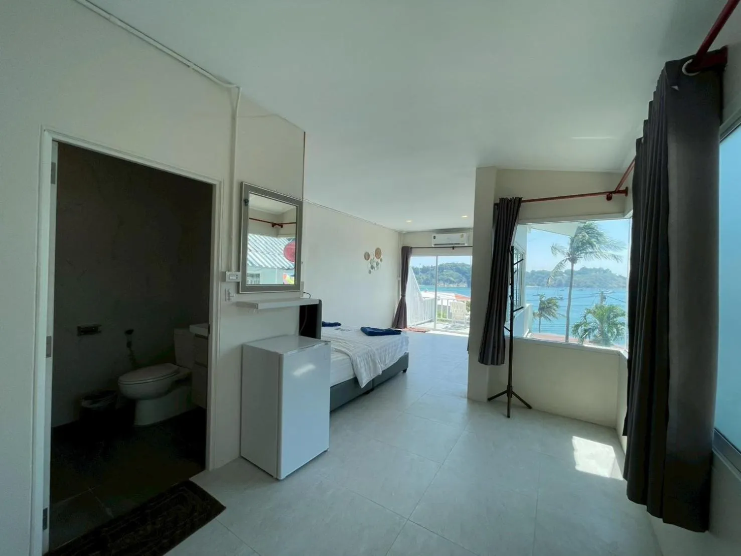 Bed in Naiharn On The Rock Resort Phuket