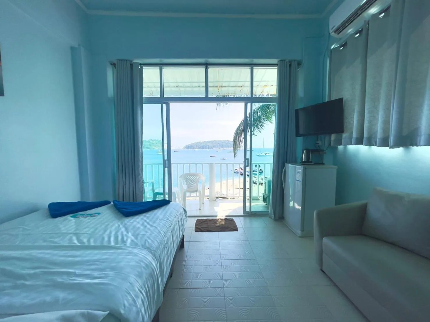 Bed in Naiharn On The Rock Resort Phuket