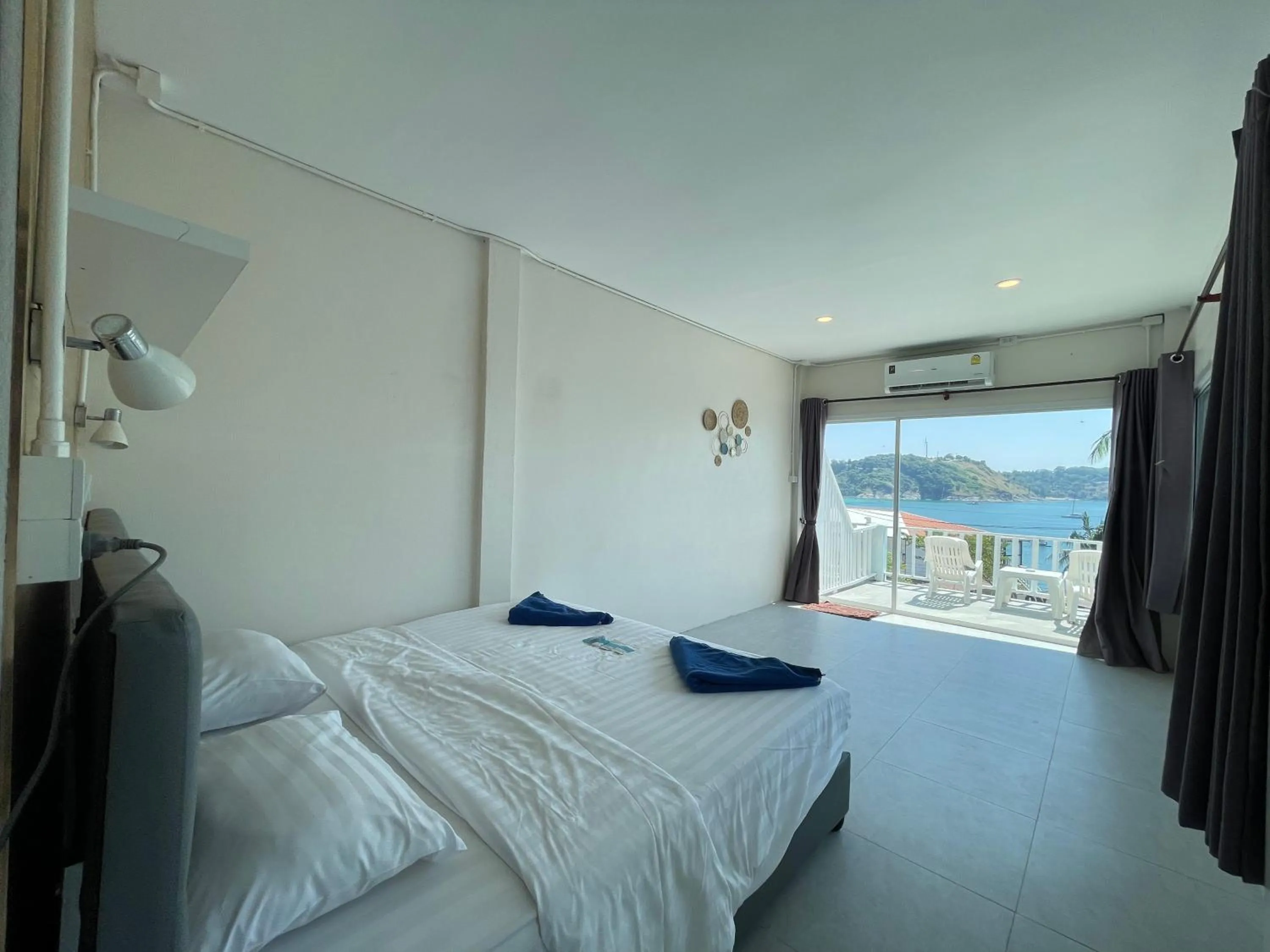 Bed in Naiharn On The Rock Resort Phuket