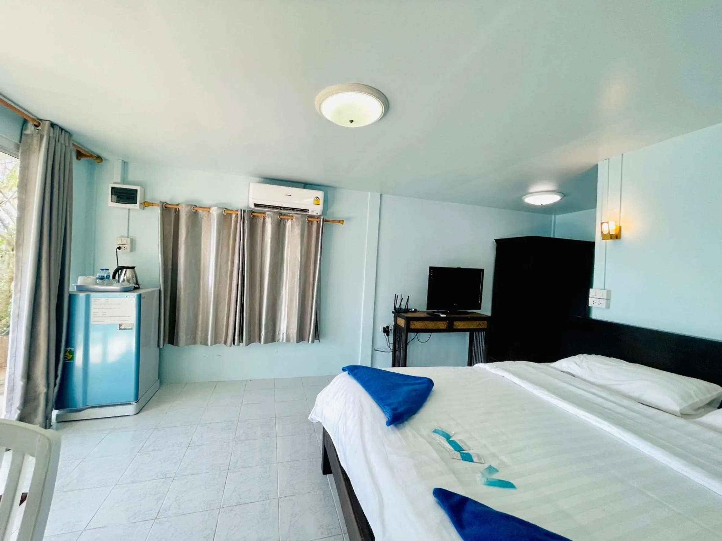 Bed in Naiharn On The Rock Resort Phuket