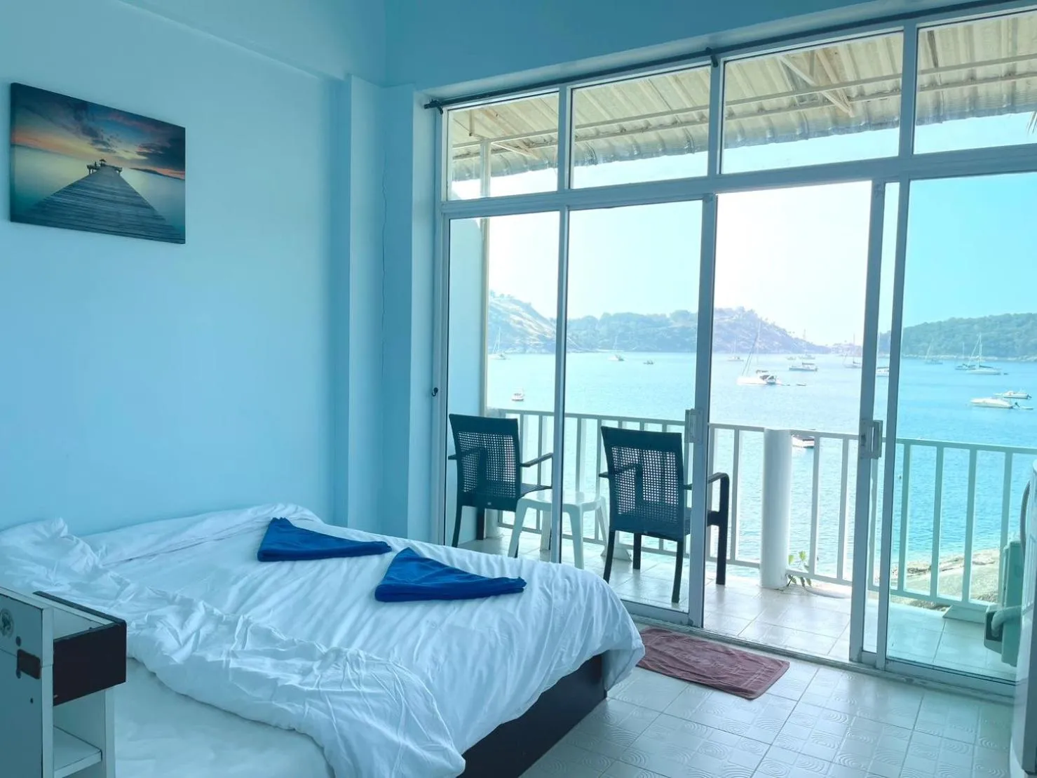 Bed in Naiharn On The Rock Resort Phuket