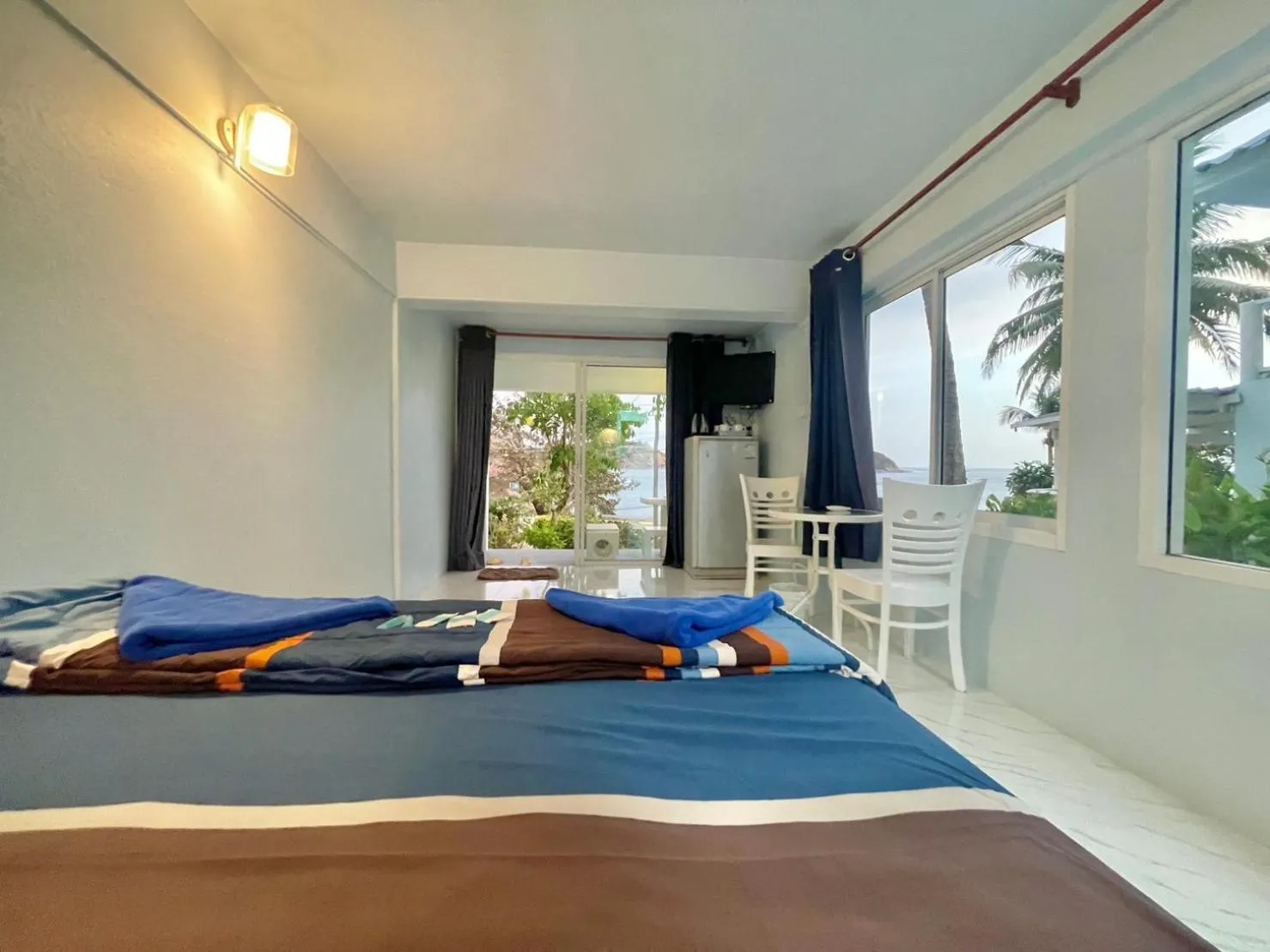 Bed in Naiharn On The Rock Resort Phuket