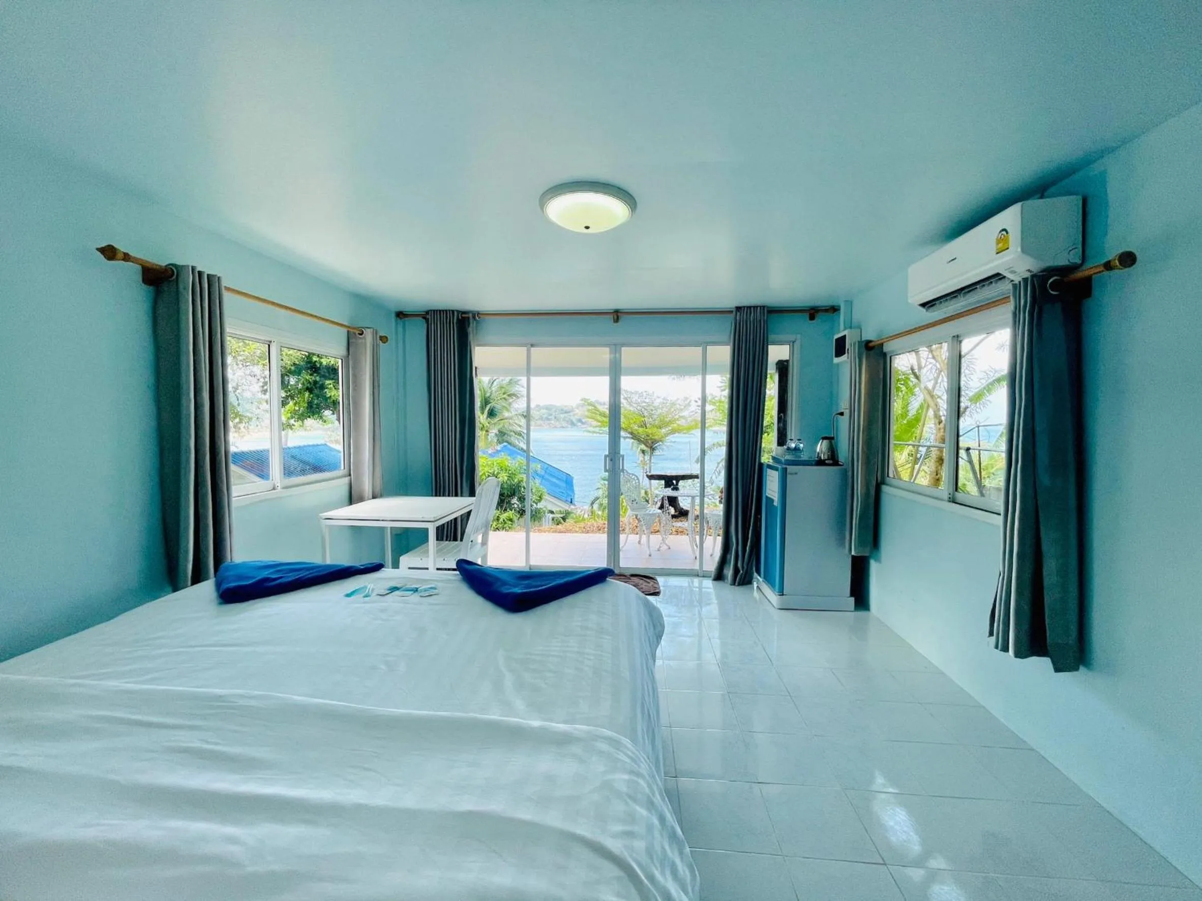Bed in Naiharn On The Rock Resort Phuket