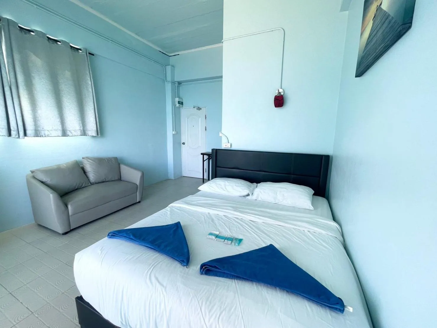 Bed in Naiharn On The Rock Resort Phuket