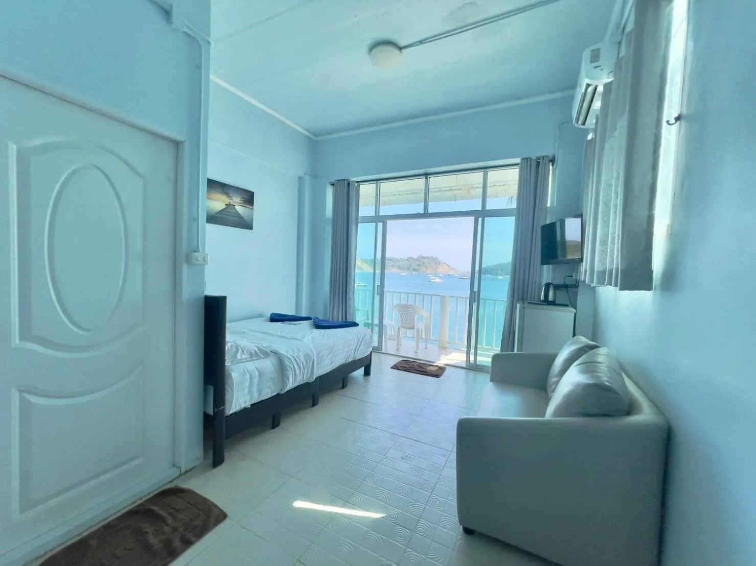 Bed in Naiharn On The Rock Resort Phuket