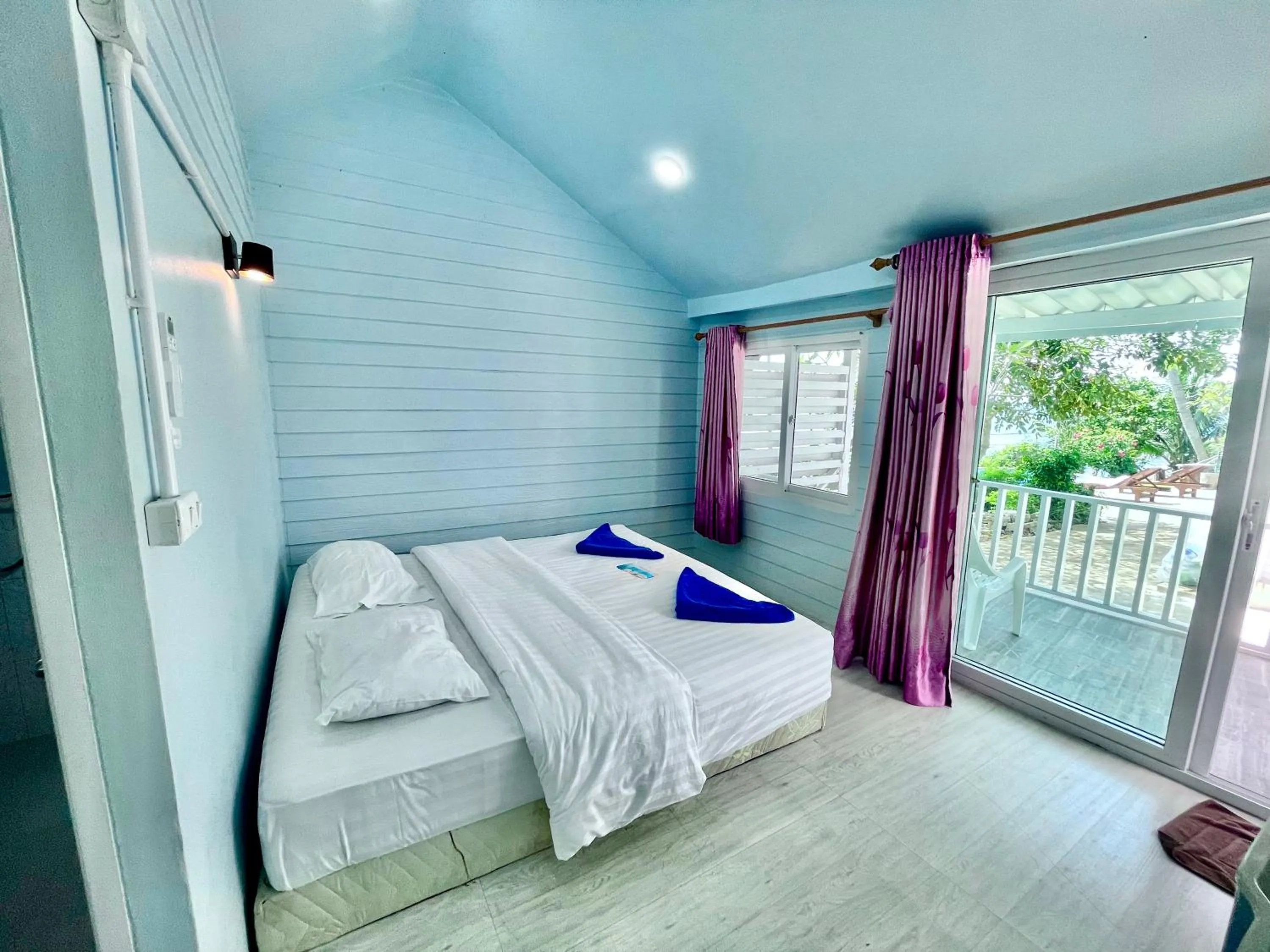 Bed in Naiharn On The Rock Resort Phuket