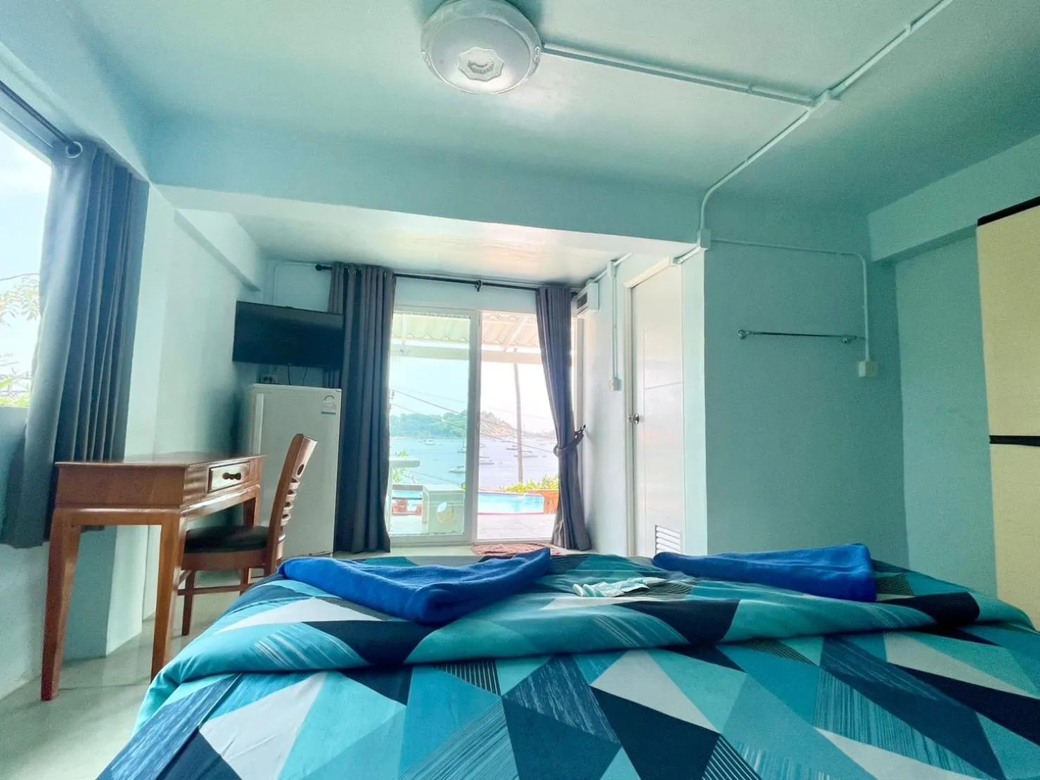 Bed in Naiharn On The Rock Resort Phuket