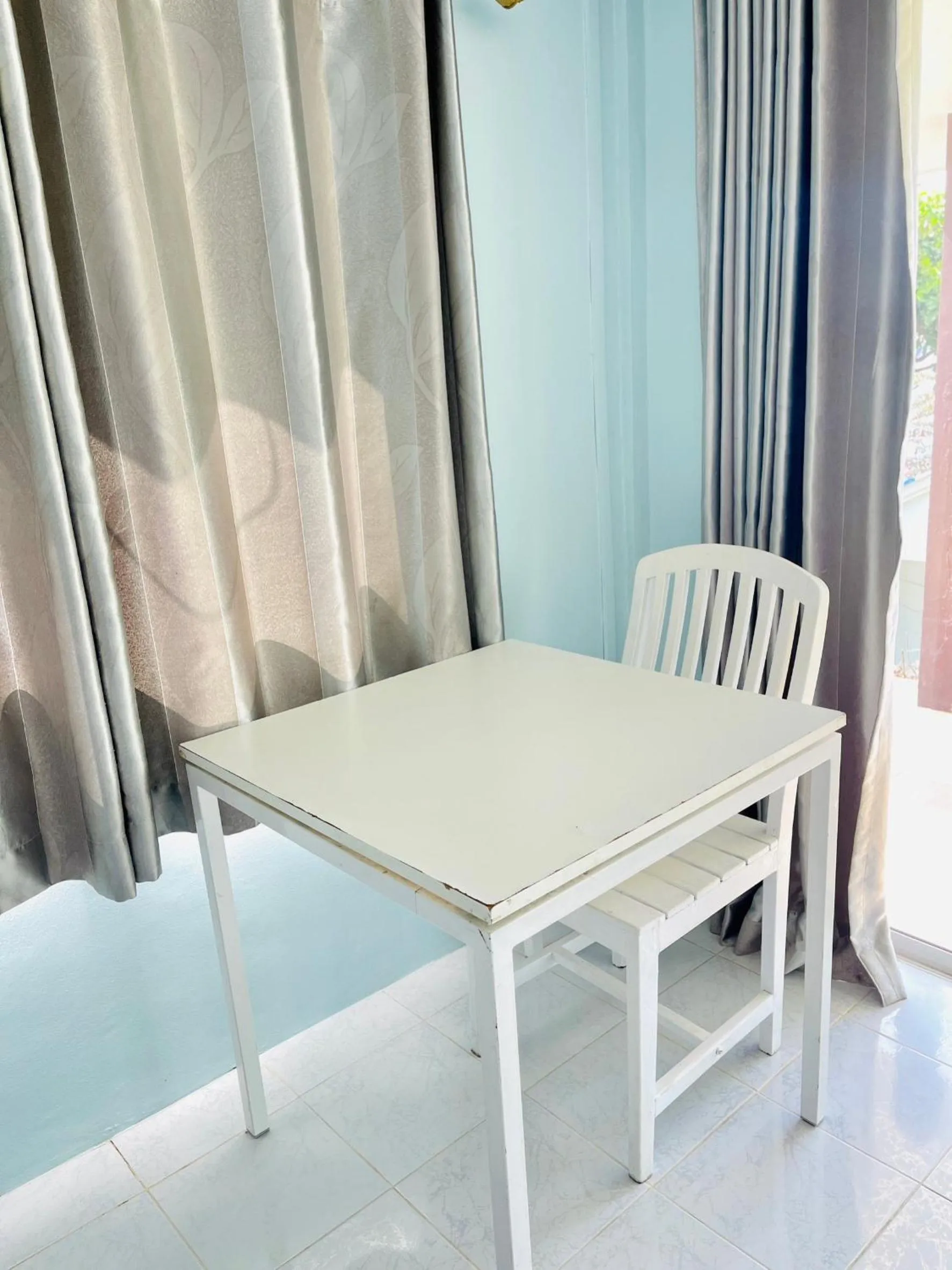 Seating area in Naiharn On The Rock Resort Phuket