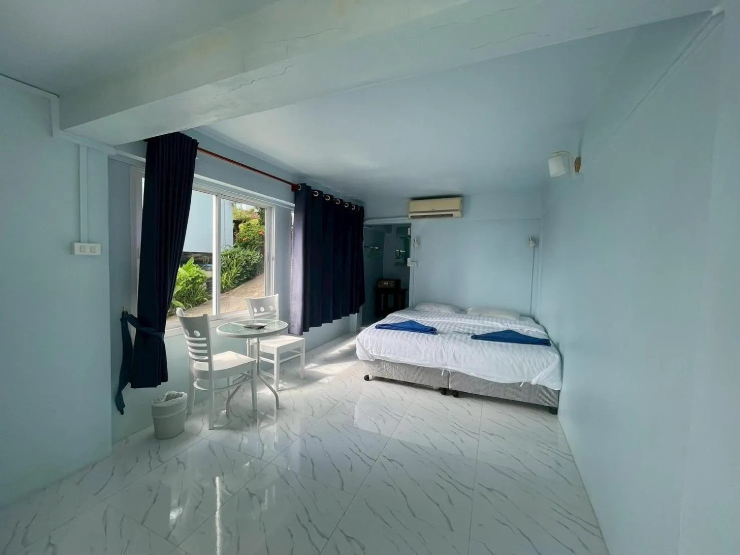 Bed in Naiharn On The Rock Resort Phuket