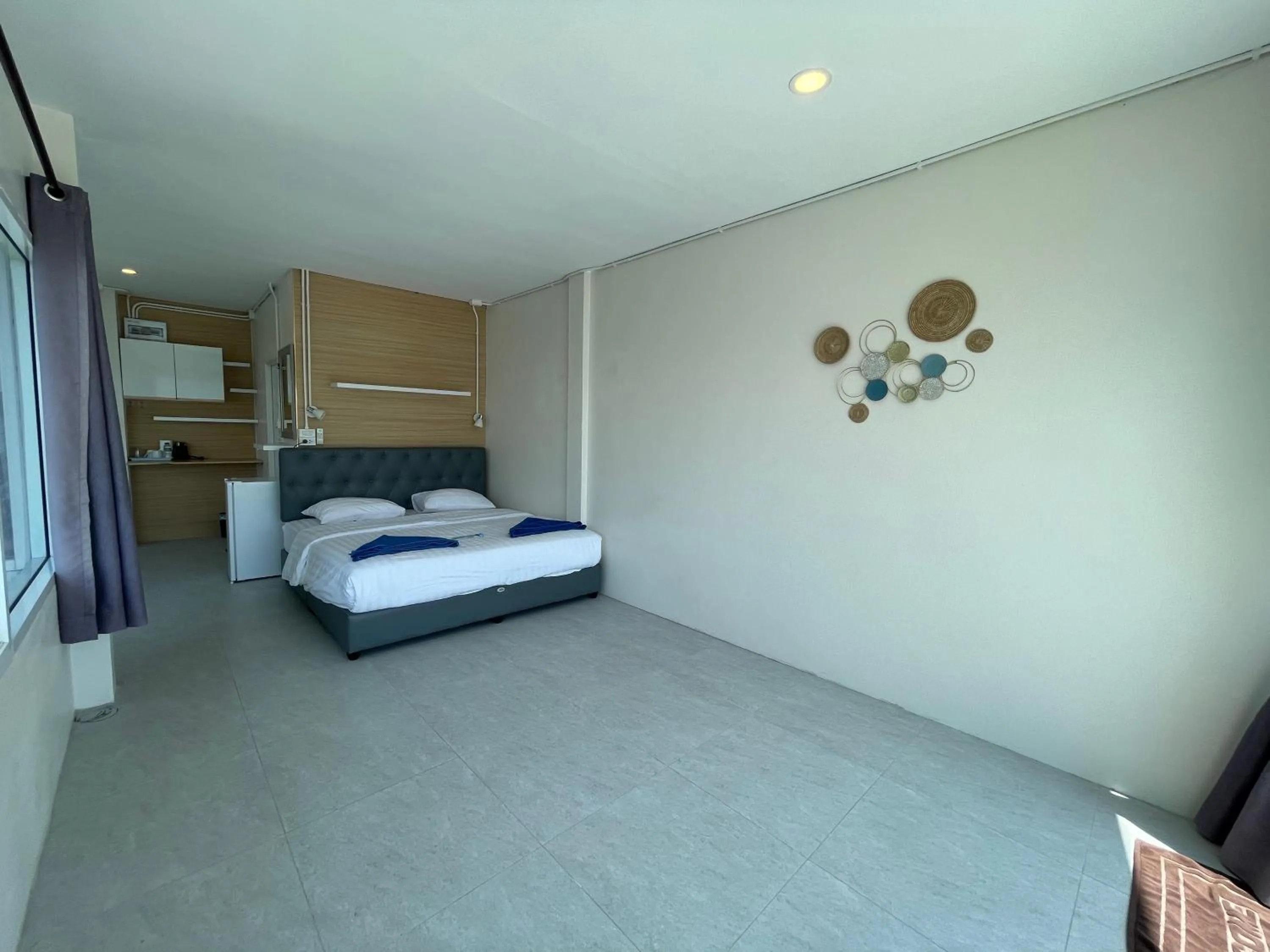 Bed in Naiharn On The Rock Resort Phuket