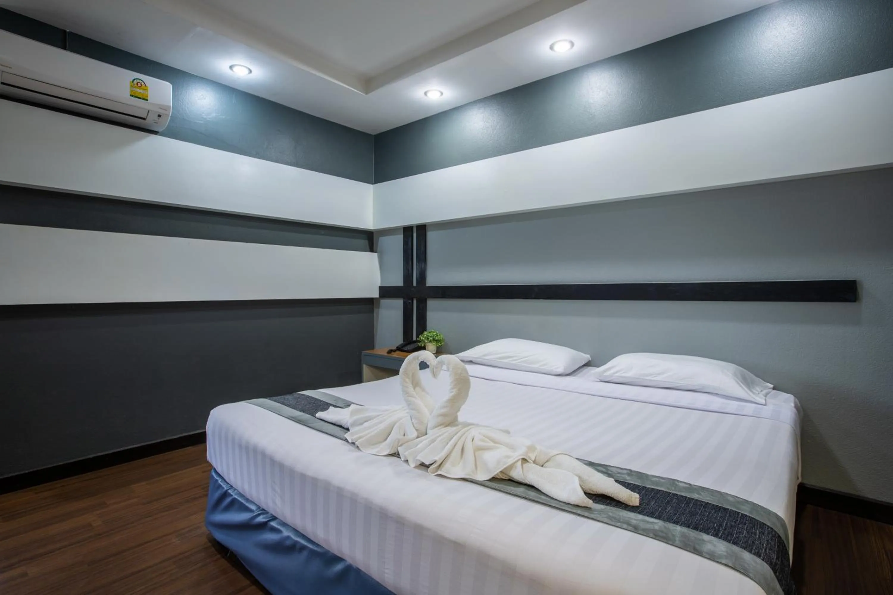 Bed in Pimann Inn Hotel