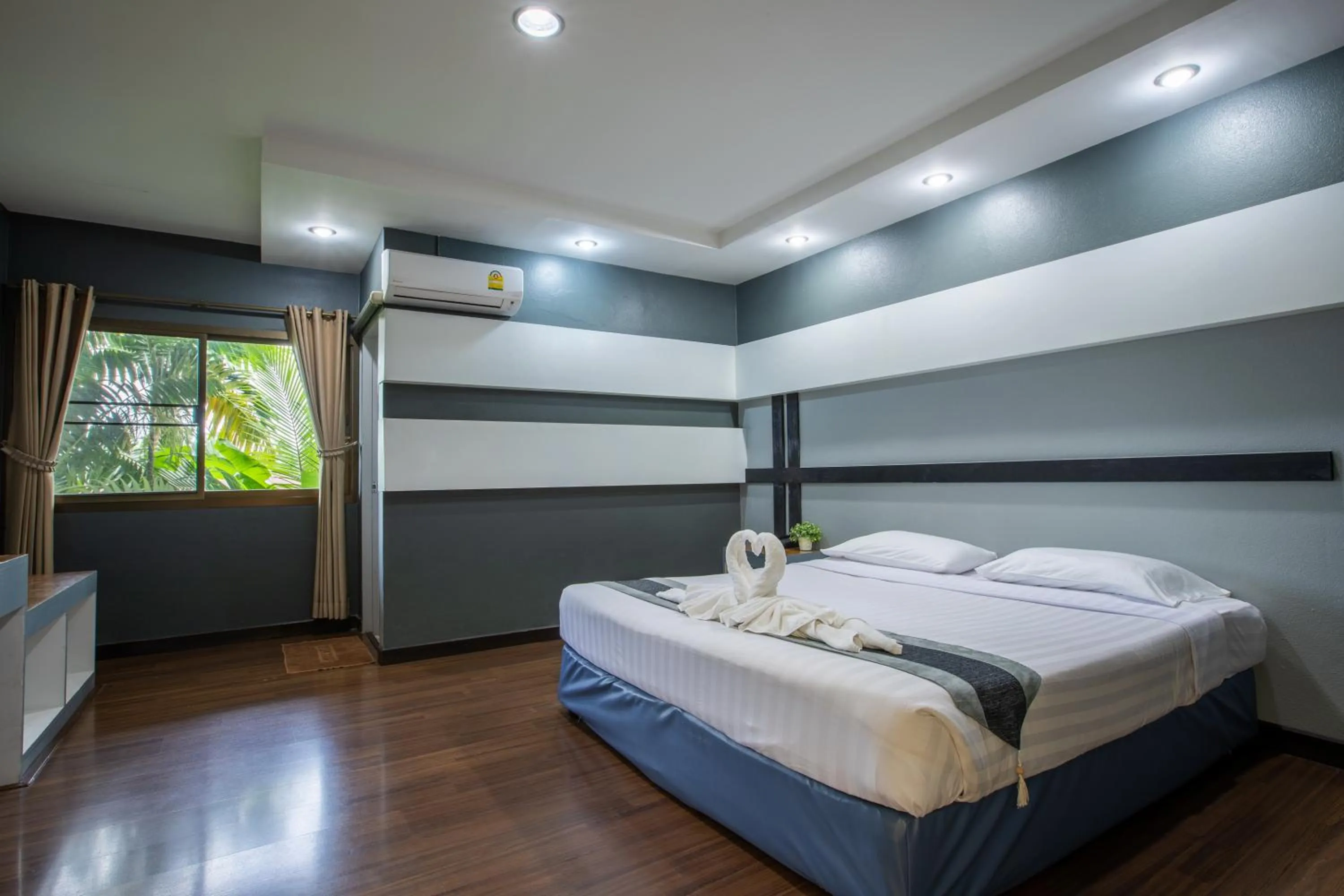 Bed in Pimann Inn Hotel