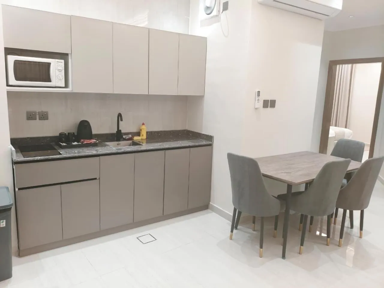 Kitchen or kitchenette in Burj Al Hayat Furnished Suites - Al Malaz