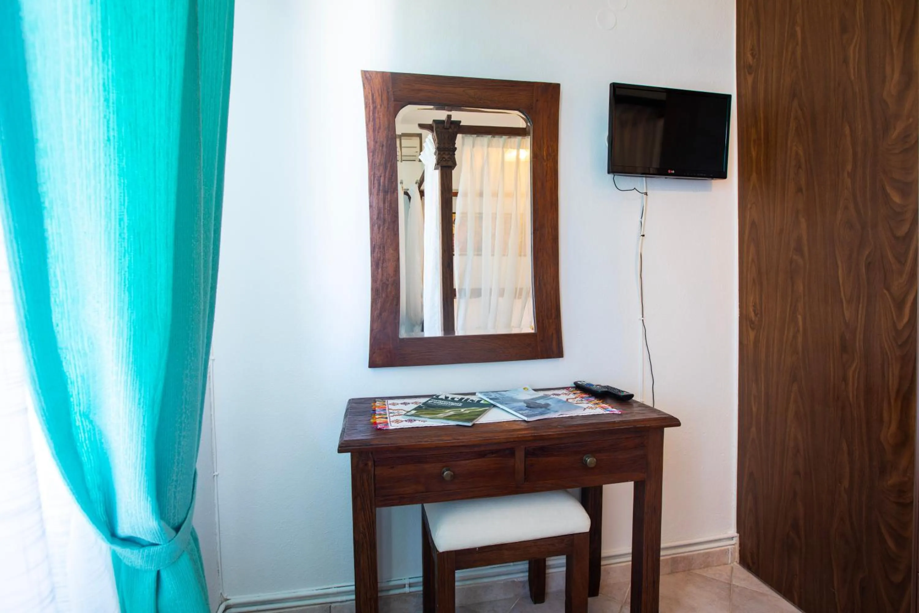 Bedroom in Kastro Apartments