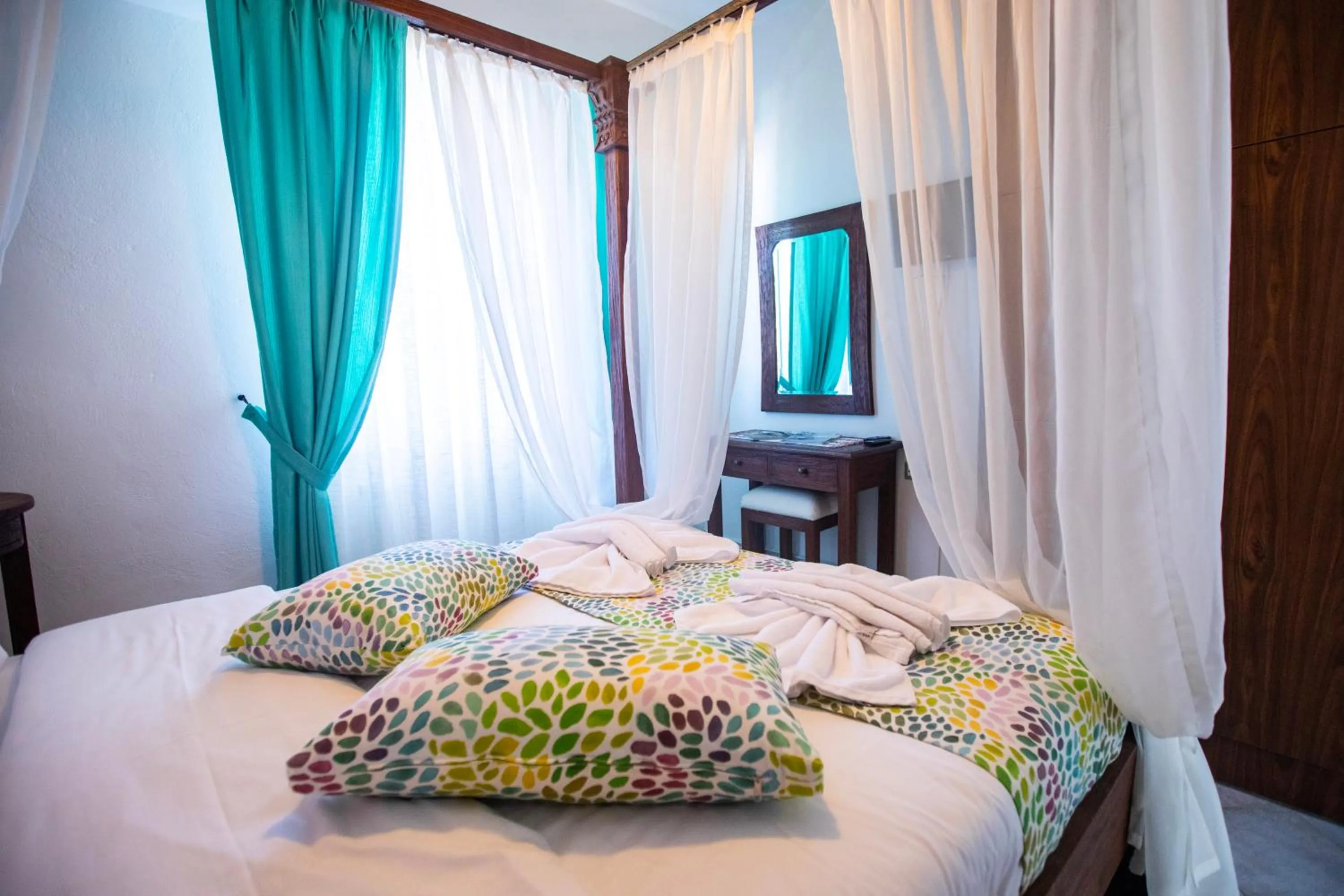 Bed in Kastro Apartments